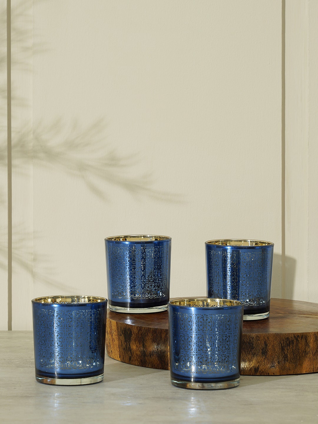 

Pure Home and Living Blue & Gold Toned 4 Pieces Textured Glass Votive Candle Holders