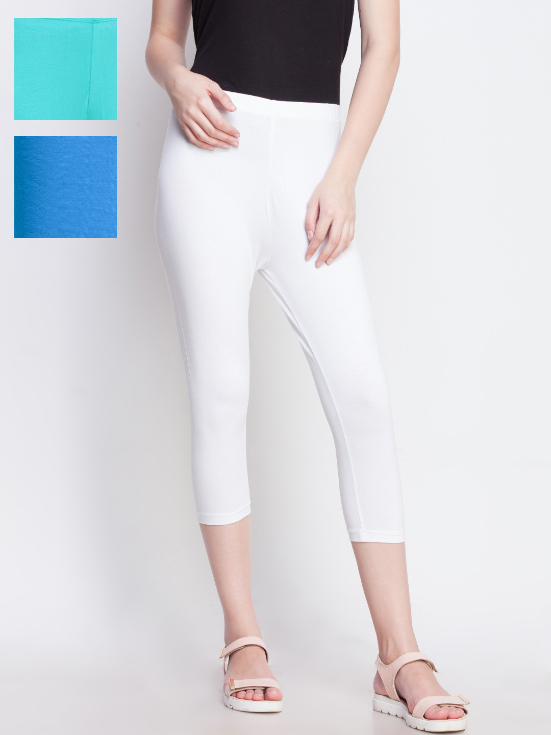 

Dollar Missy Women White & Sea Green Solid Slim Fit Capris