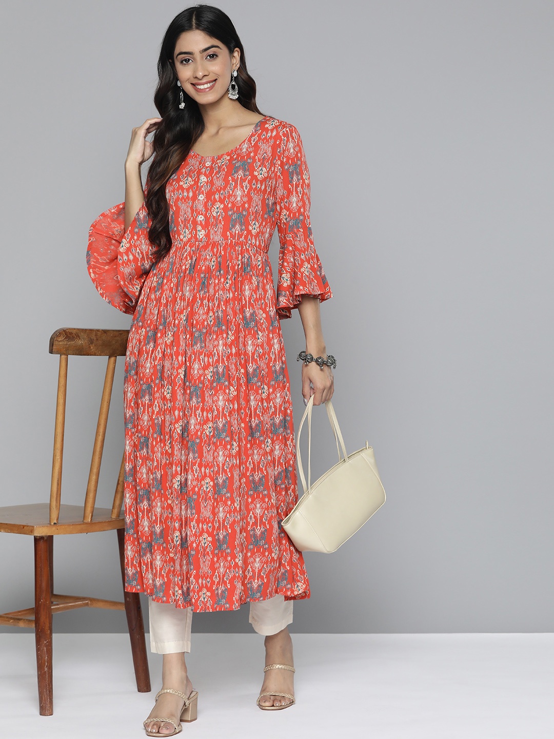 

HERE&NOW Women Ethnic Motifs Printed Flared Sleeves A-Line Kurta, Coral