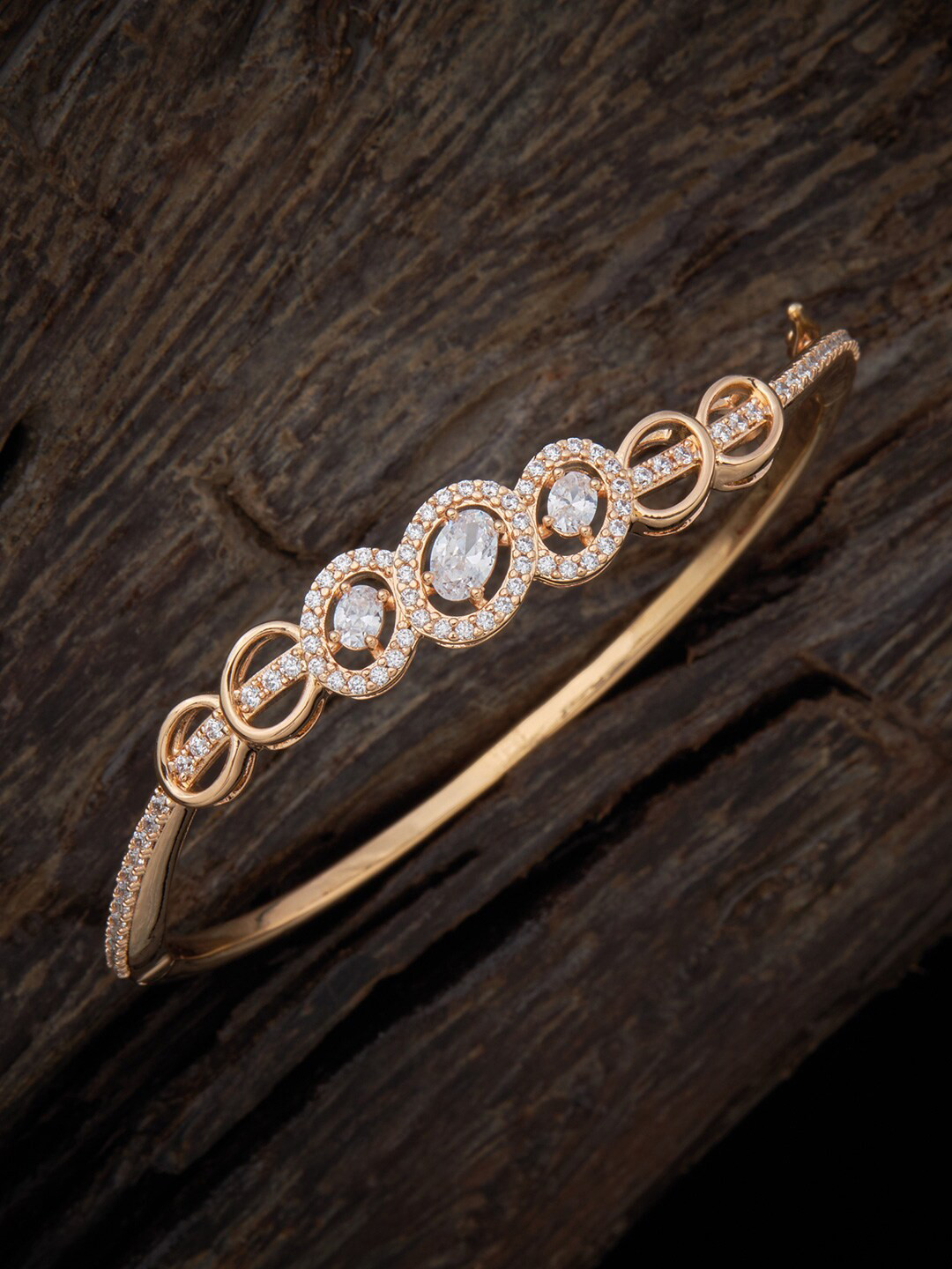 

Kushal's Fashion Jewellery Women Cubic Zirconia Gold-Plated Bangle-Style Bracelet, White