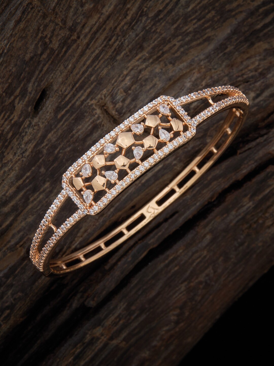 

Kushal's Fashion Jewellery Women Cubic Zirconia Gold-Plated Kada Bracelet