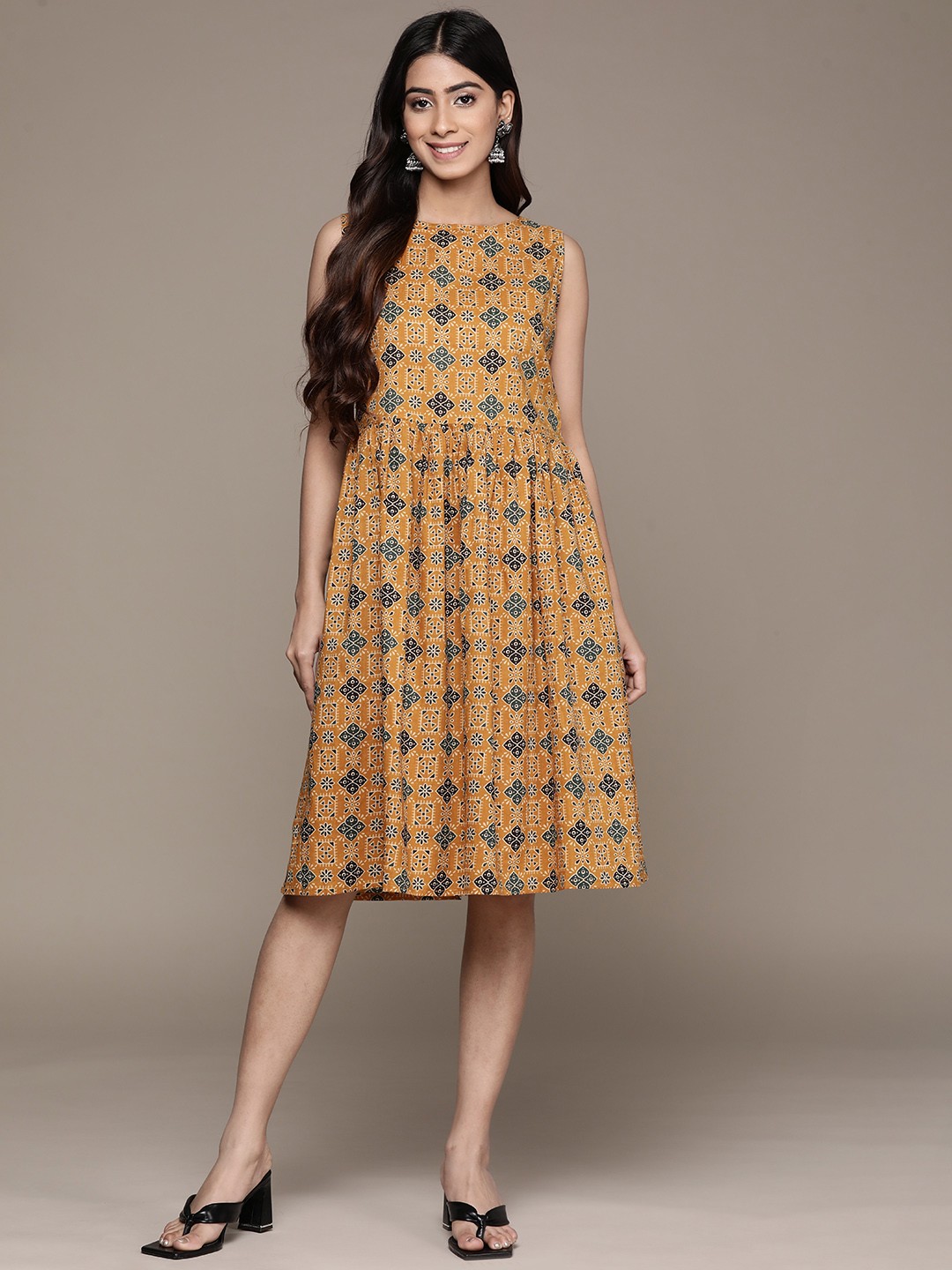 

Anubhutee Ethnic Motifs Printed A-Line Dress, Mustard