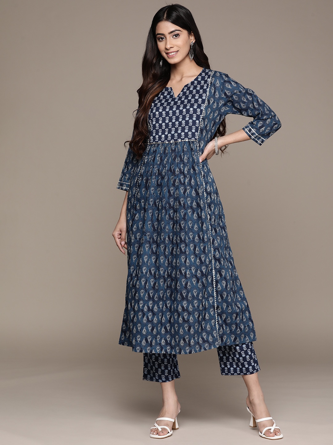 

Ishin Women Navy Blue Floral Printed Gotta Patti Pure Cotton Kurta with Trousers