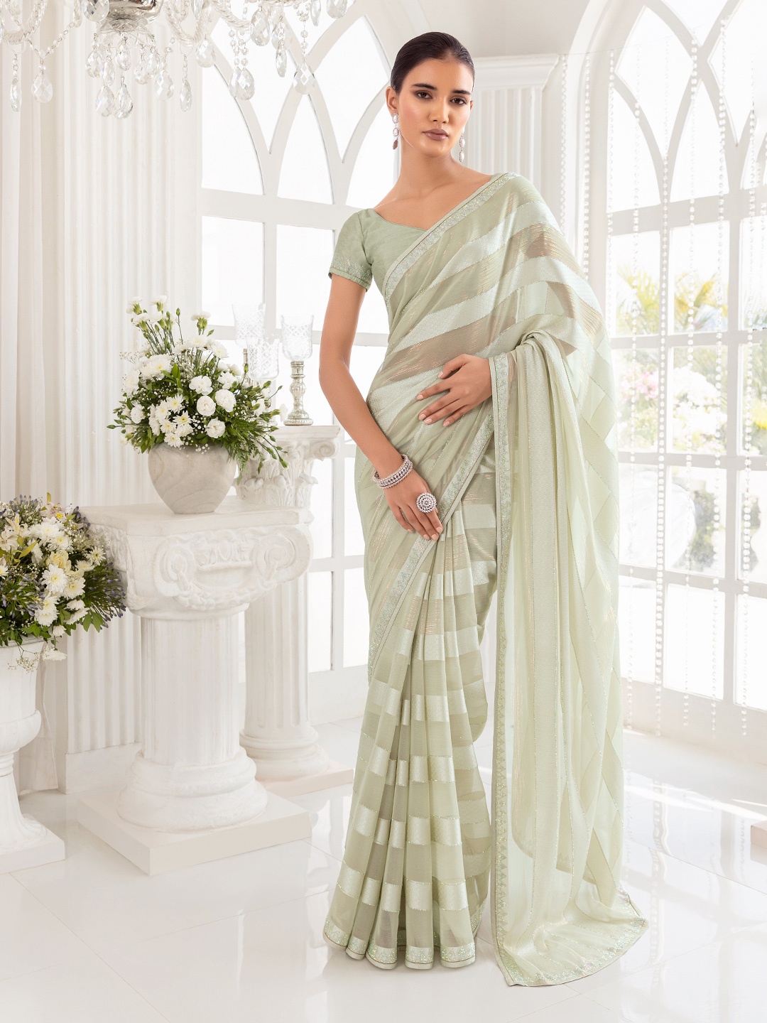 

Soch Striped Embellished Zari Pure Georgette Saree, Green
