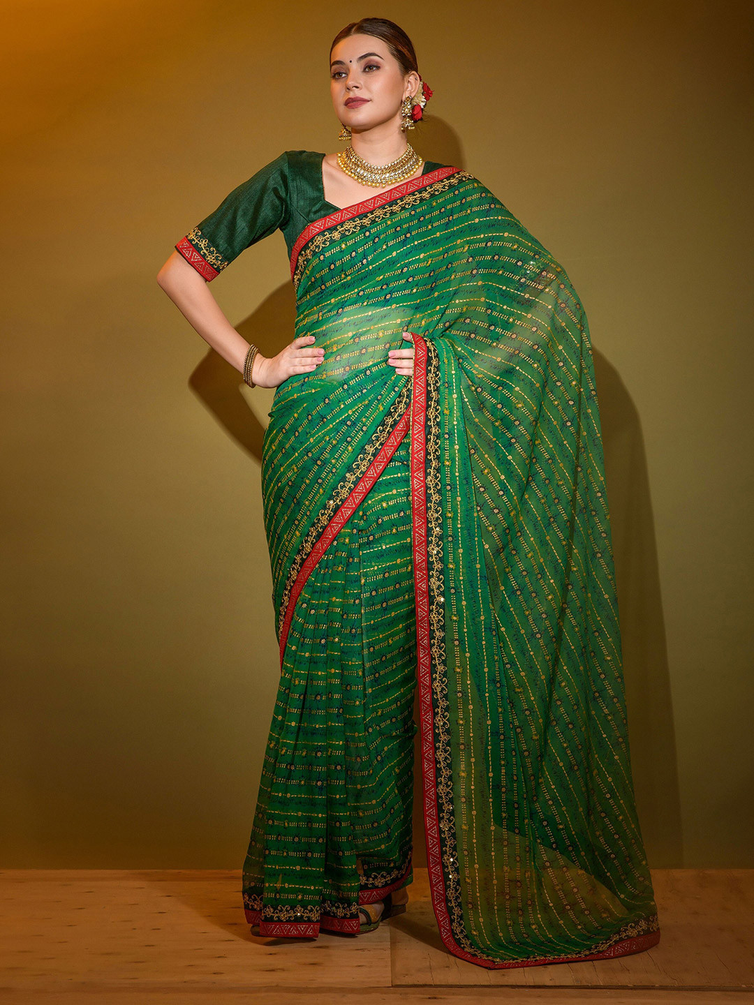 

Mitera Striped Sequinned Leheriya Saree, Green