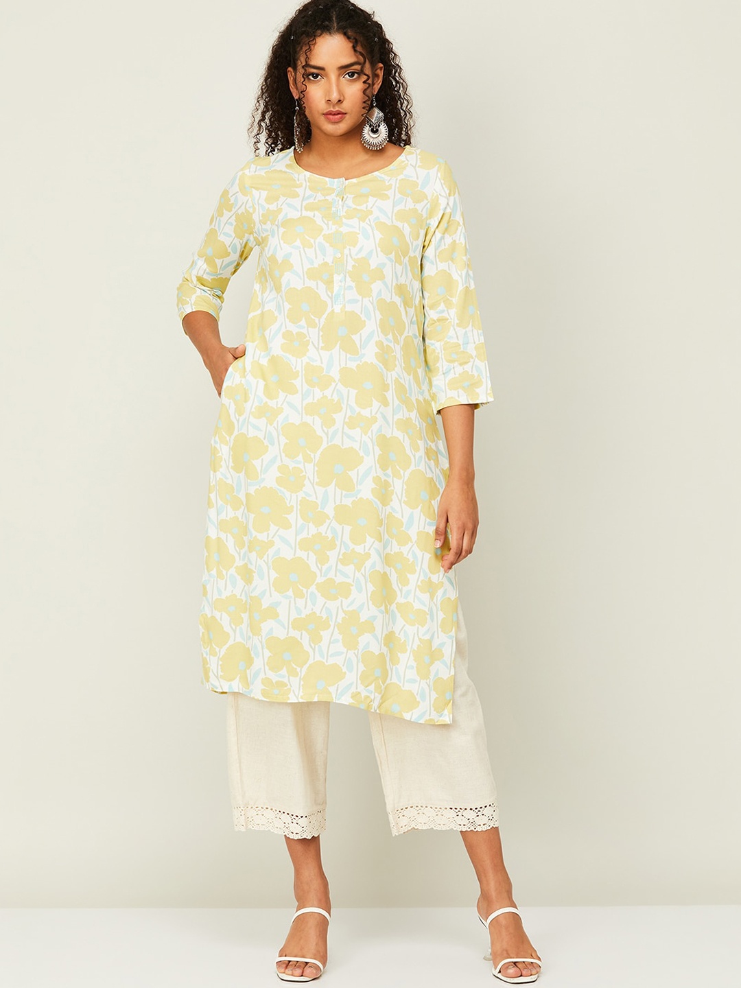 

Melange by Lifestyle Floral Printed Round Neck Kurta, Yellow