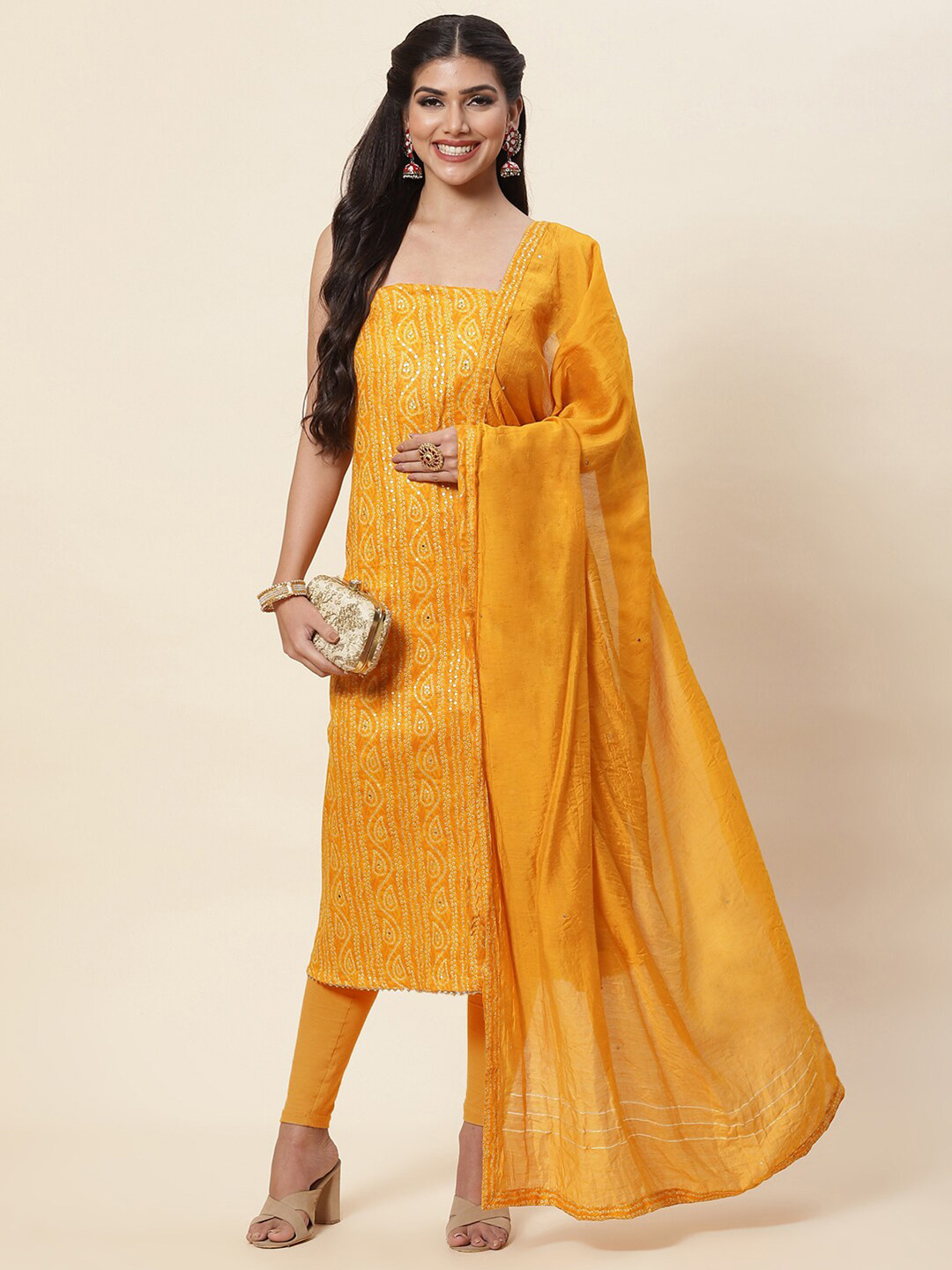 

Meena Bazaar Mustard Printed Pure Cotton Unstitched Dress Material