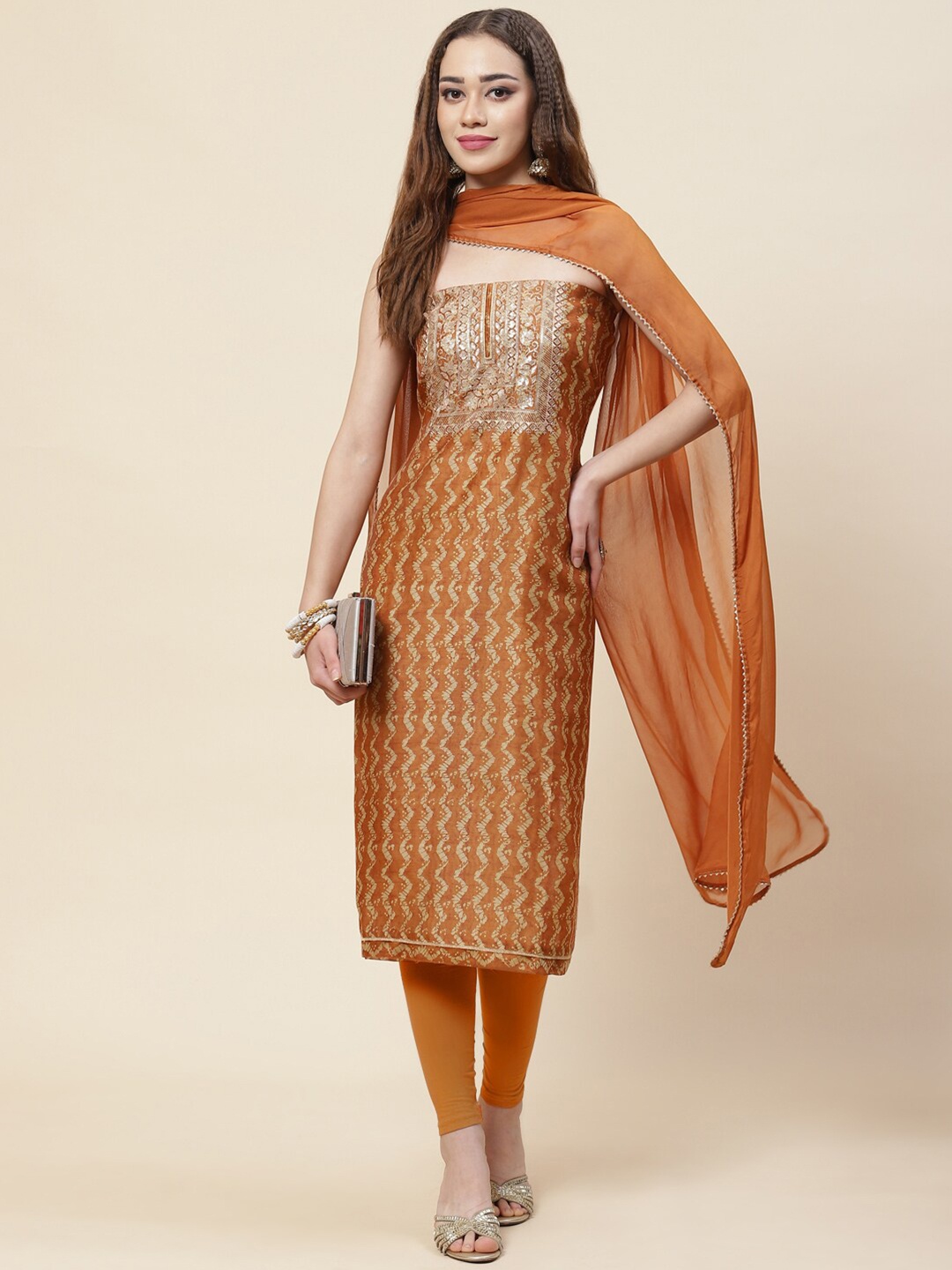 

Meena Bazaar Orange & Gold-Toned Embroidered Pure Silk Unstitched Dress Material