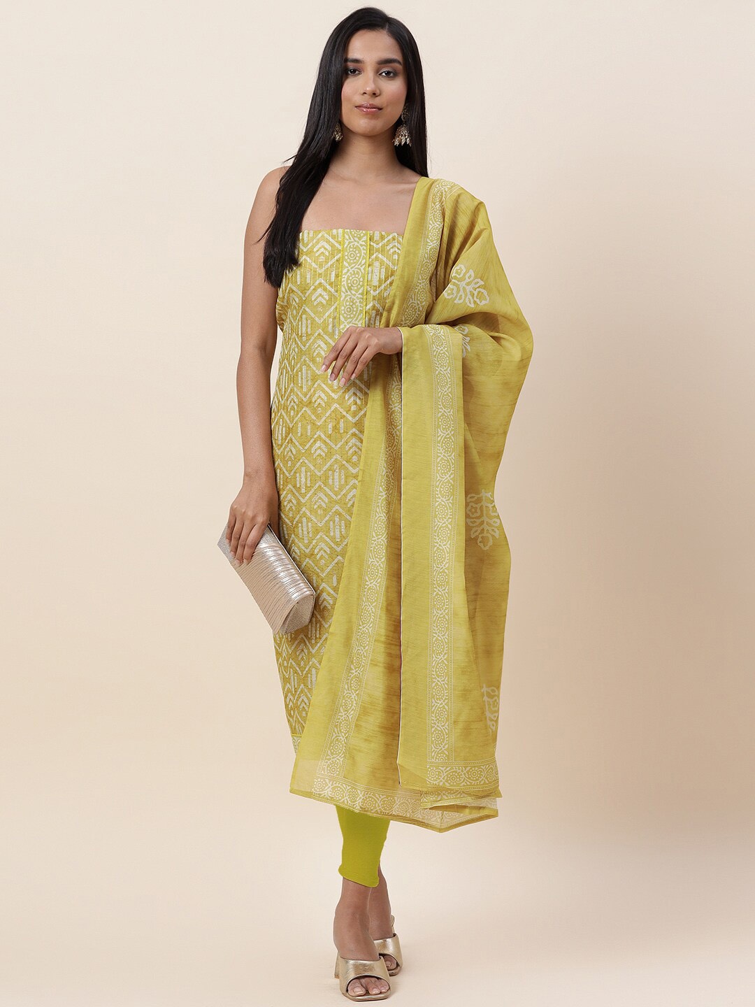 

Meena Bazaar Mustard & White Printed Pure Silk Unstitched Dress Material