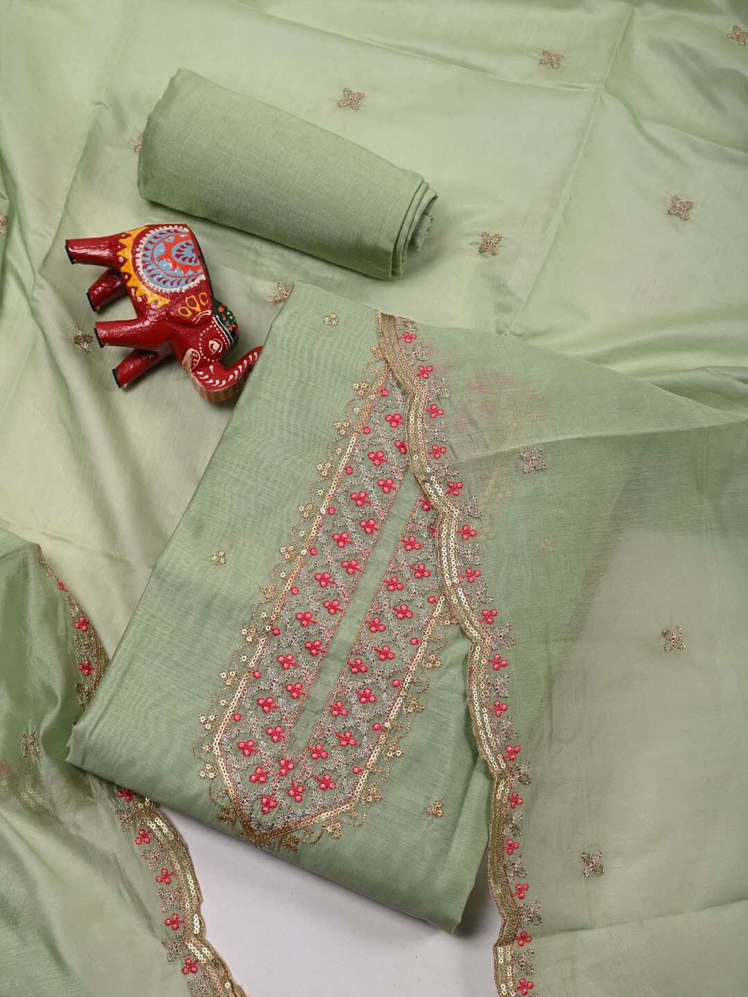 

Meena Bazaar Green & Pink Embroidered Pure Silk Unstitched Dress Material