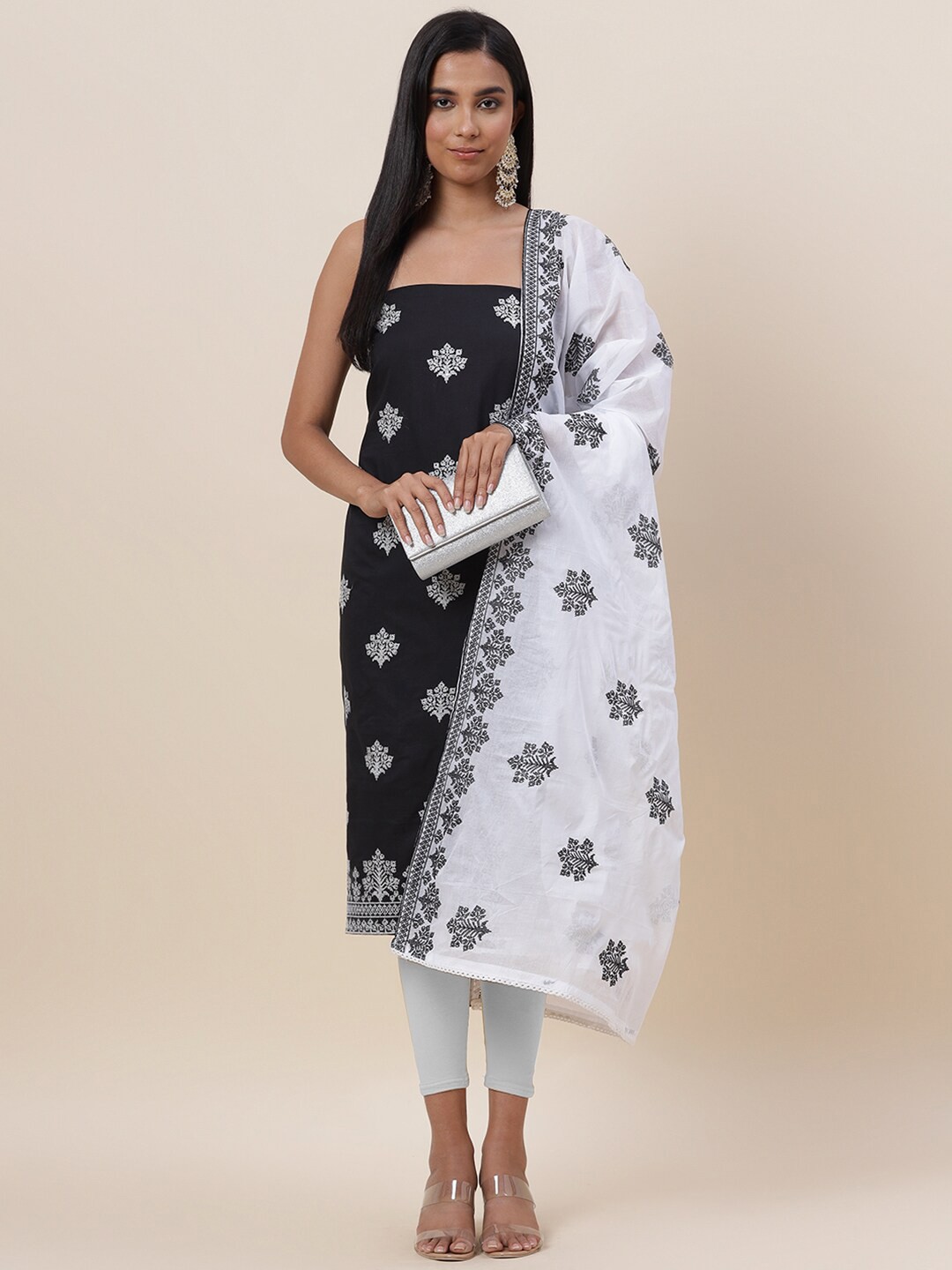 

Meena Bazaar Black & White Printed Pure Cotton Unstitched Dress Material