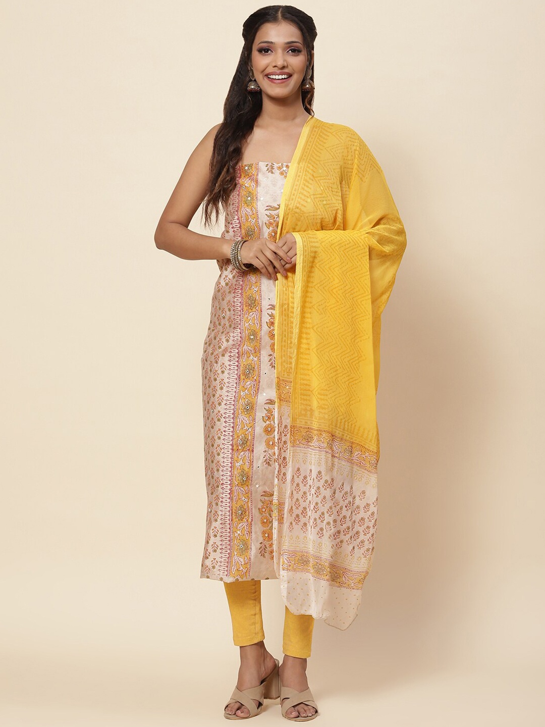 

Meena Bazaar Beige & Mustard Printed Pure Silk Unstitched Dress Material