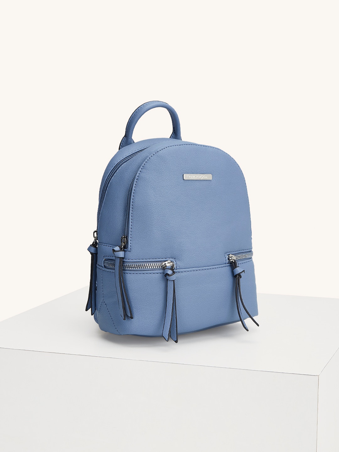 

Forever Glam by Pantaloons Textured Backpacks With Tasselled, Blue