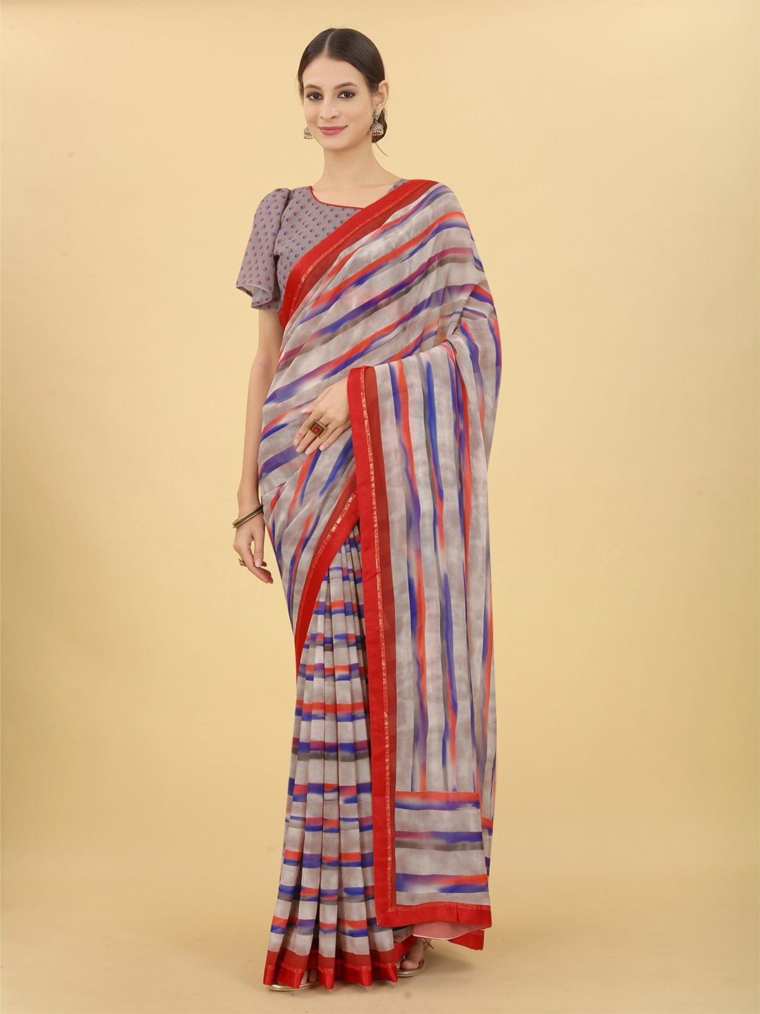 

UNITED LIBERTY Leheriya Printed Pure Georgette Saree, Red