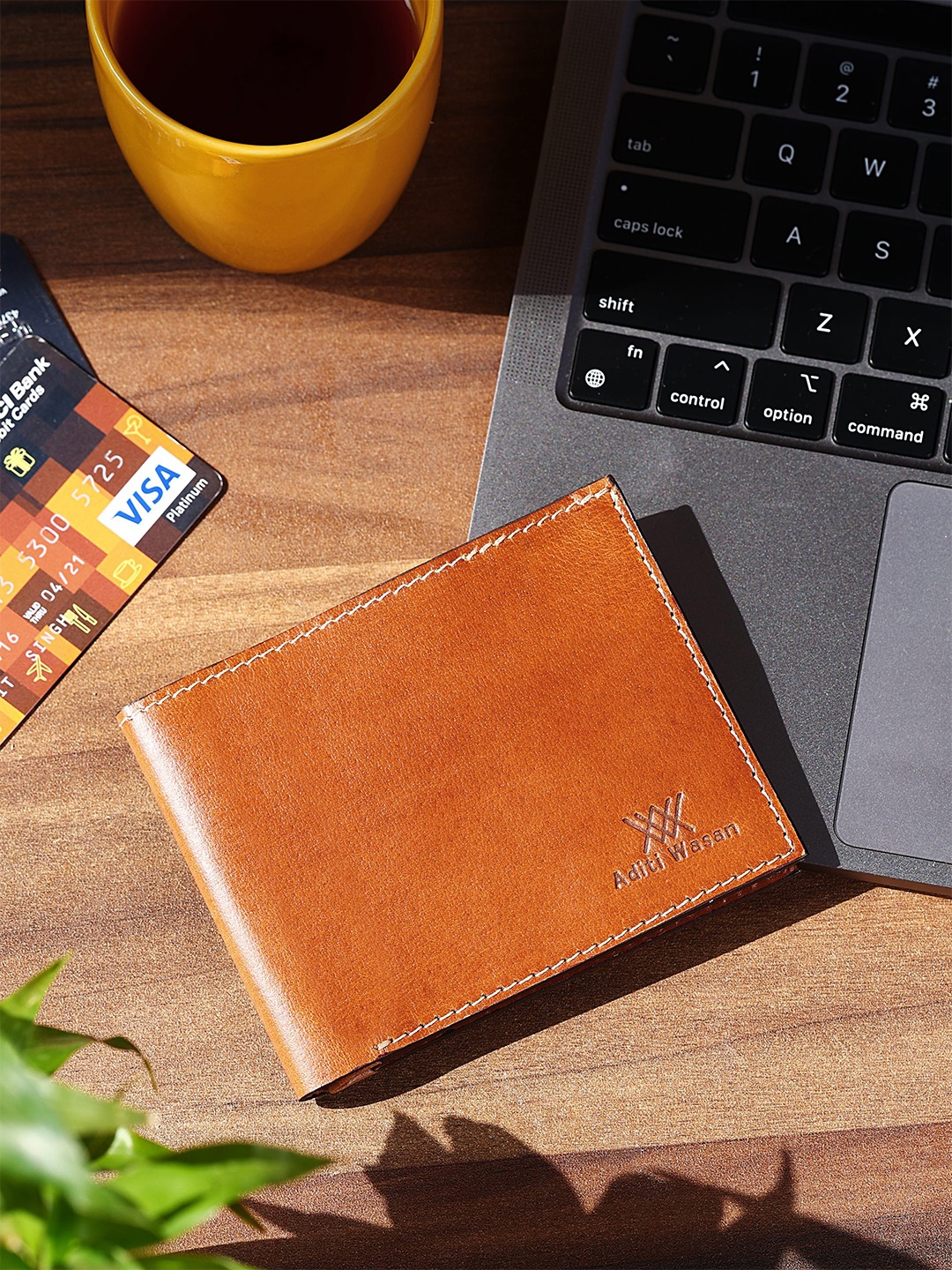 

Aditi Wasan Men Tan Leather Two Fold Wallet