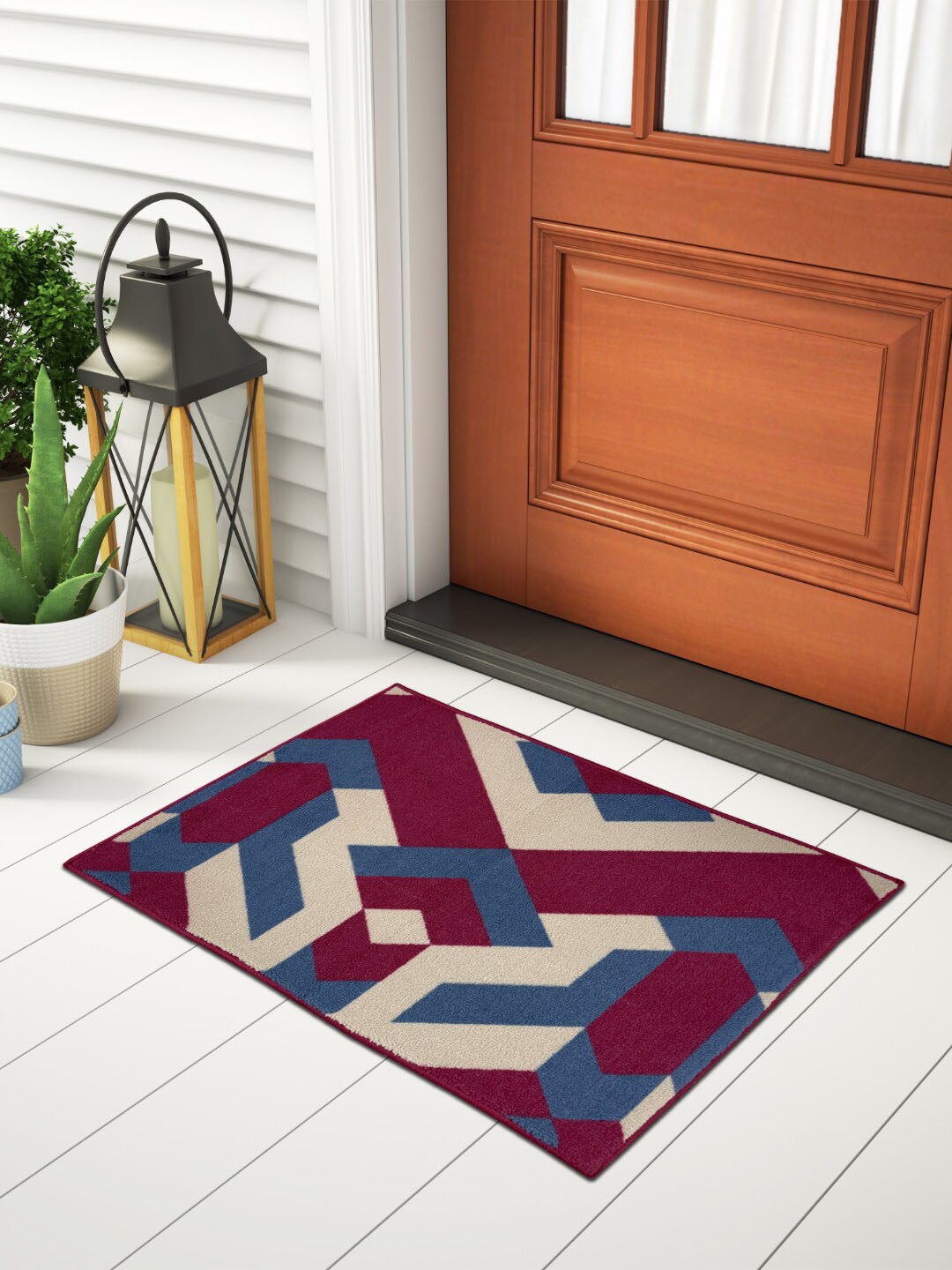

Welspun Red & Blue Printed Durability Soft Feel Fade Resistant Easy Care Doormat