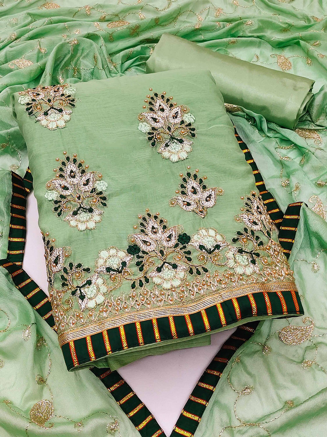 

KALINI Sea Green & Black Embroidered Unstitched Dress Material