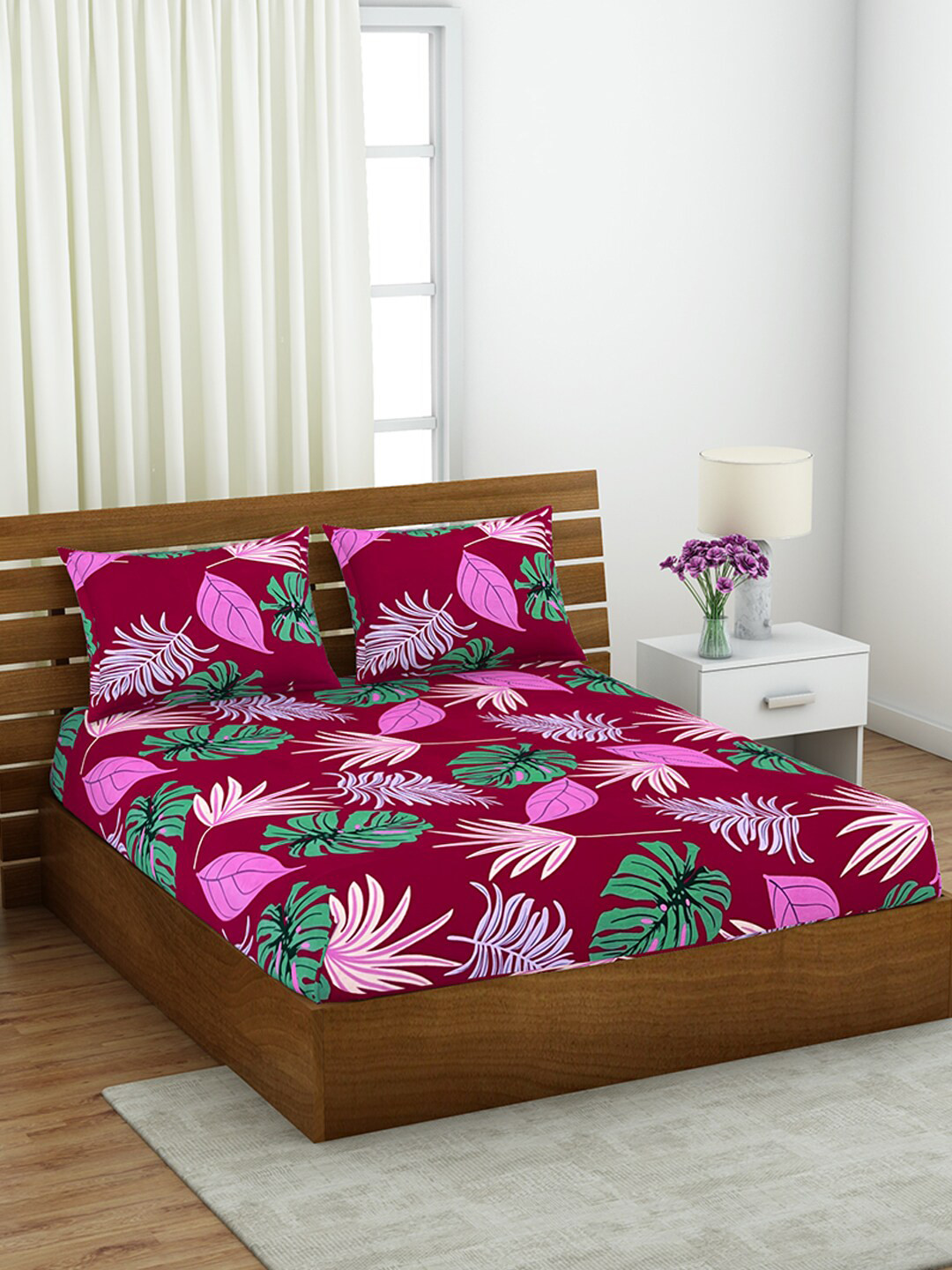 

Welspun Shimmer Magenta & Pink Printed 144 TC Cotton Queen Bedsheet & 2 Pillow Covers