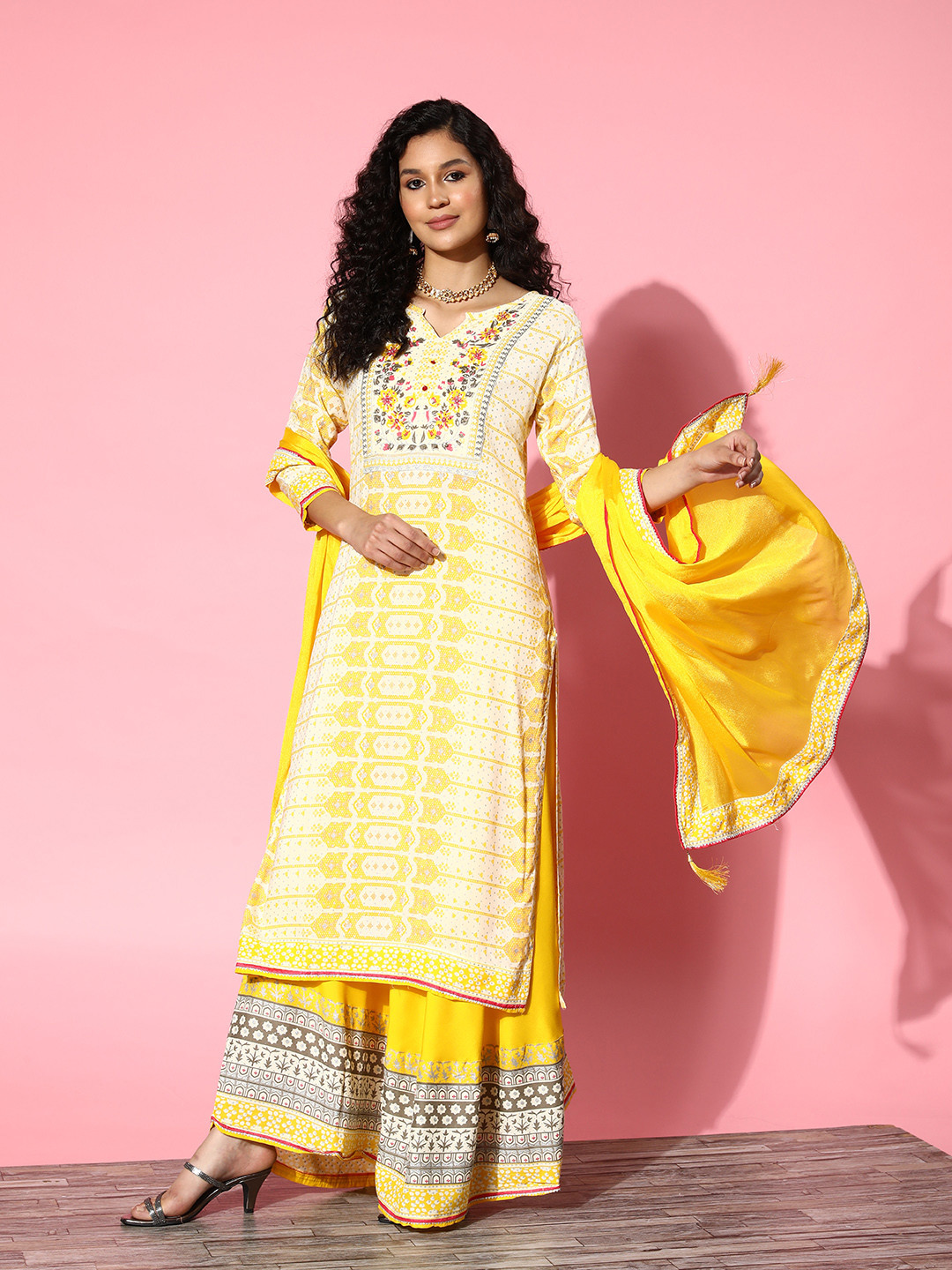 

Sangria Women Yellow Floral Embroidered Regular Thread Work Kurta with Skirt & With Dupatta