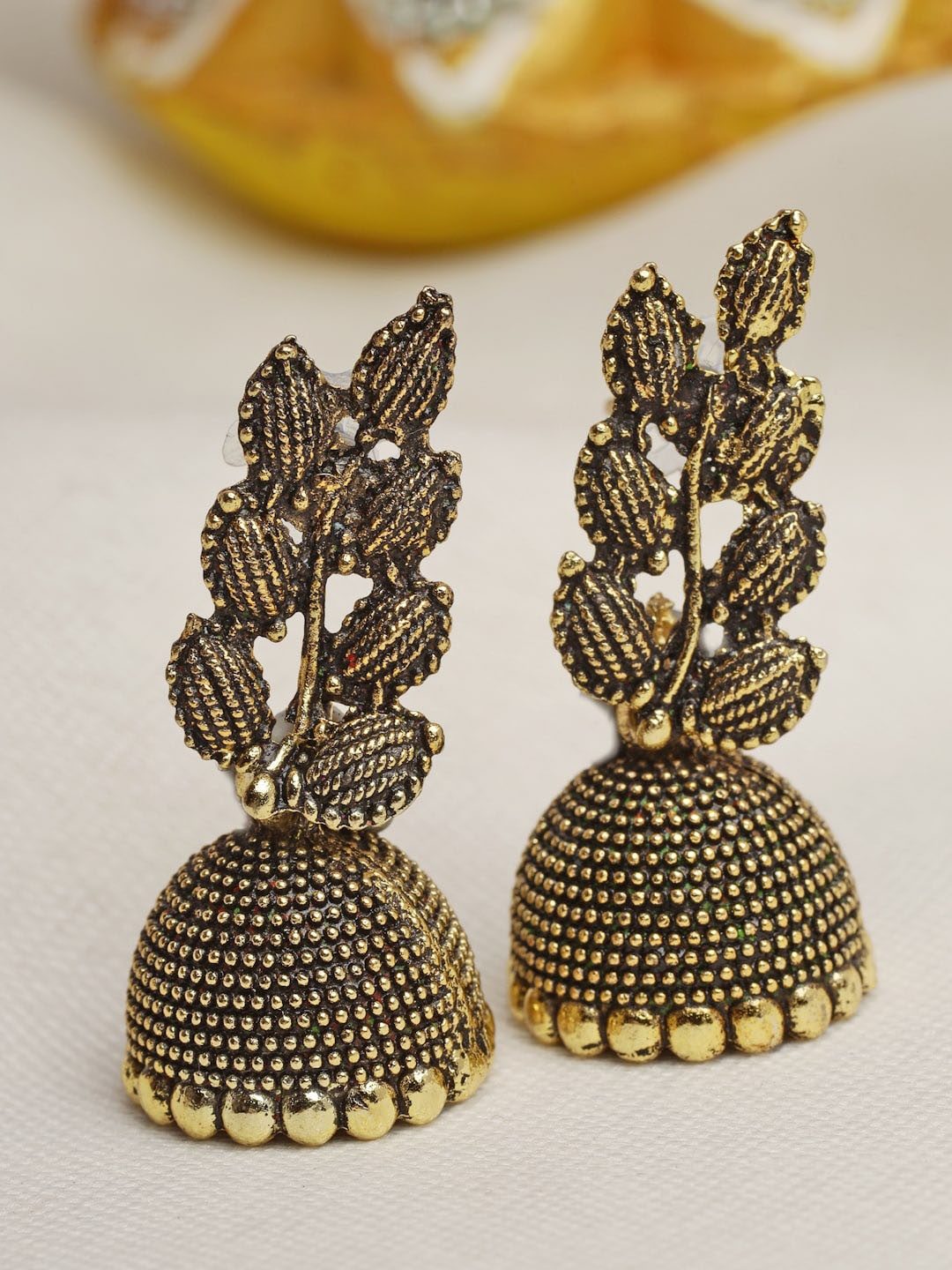 

Moedbuille Gold-Plated Leaf Shaped Jhumkas Earrings, Black