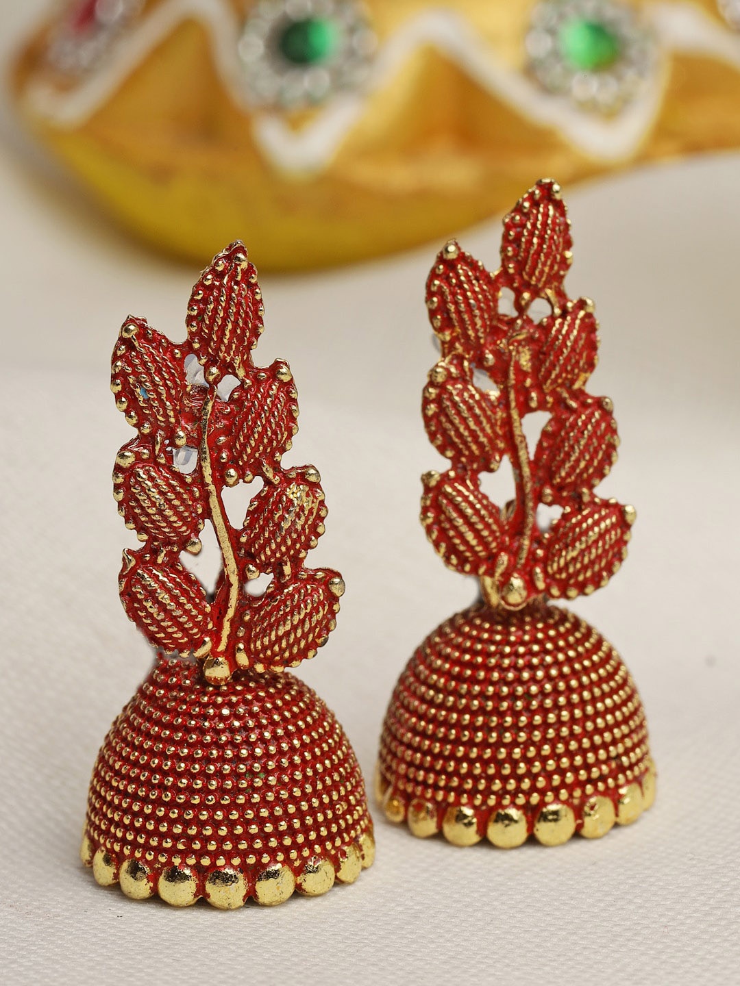 

Moedbuille Gold Plated Leaf Design Shaped Antique Jhumkas Earrings, Red