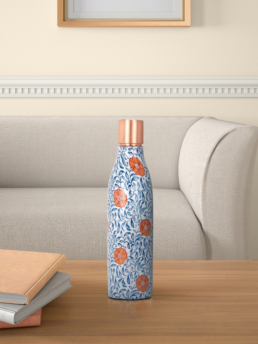 

Living scapes by Pantaloons White & Blue Floral Printed Copper Water Bottle 750ml
