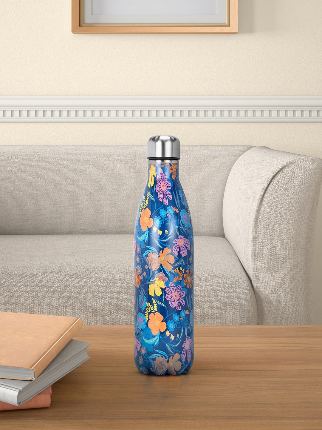 

Living scapes by Pantaloons Blue & Orange Floral Printed Single Wall Vacuum Water Bottle