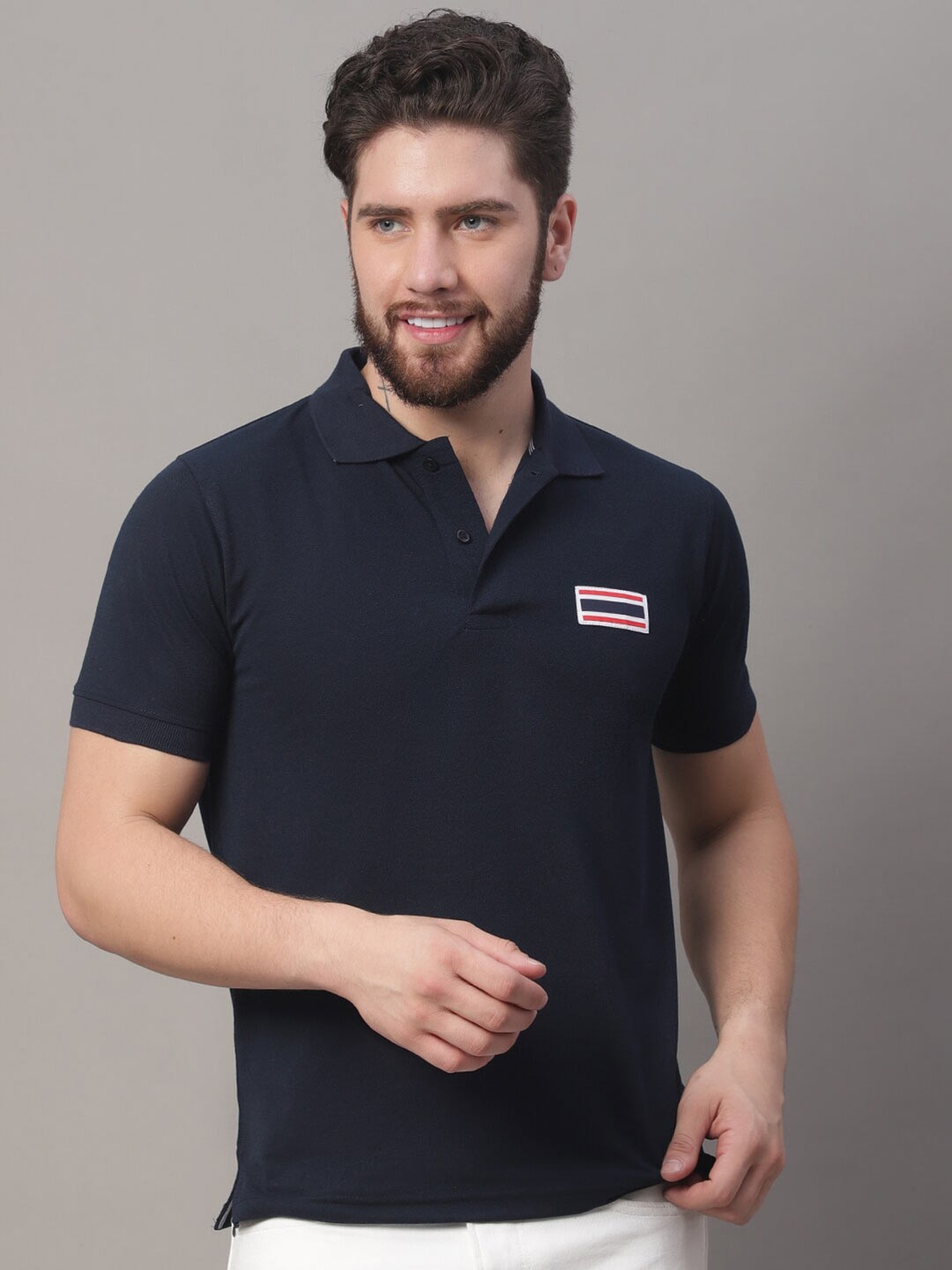 

Obaan Men Navy Blue Polo Collar T-shirt