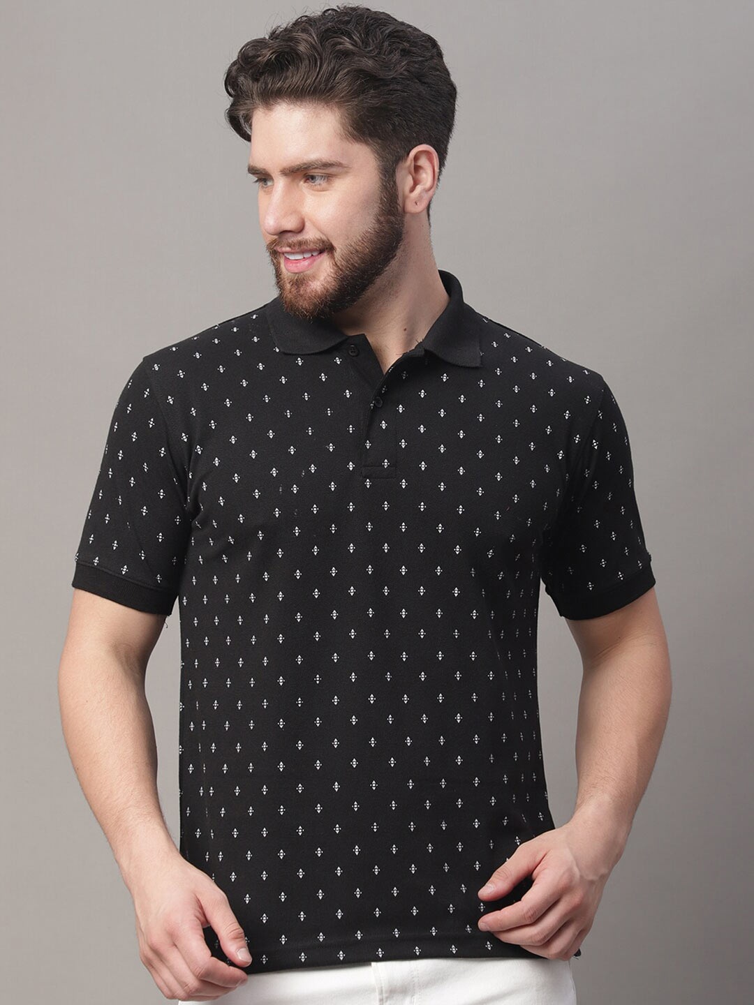 

Obaan Men Black Printed Polo Collar T-shirt