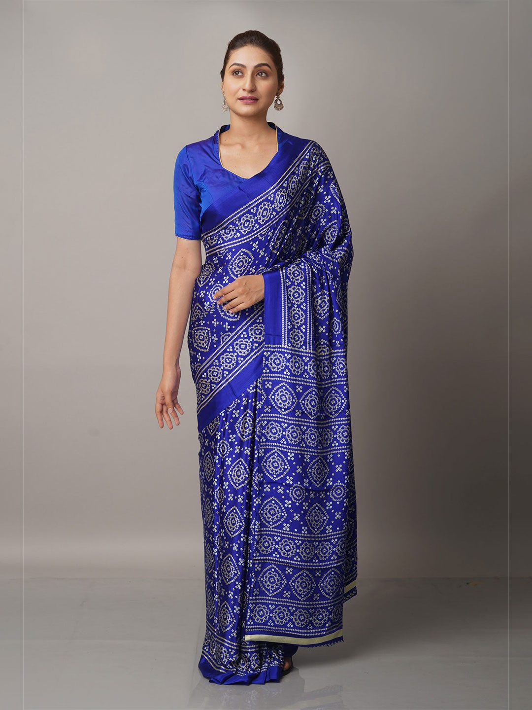 

Unnati Silks Blue & White Bandhani Saree