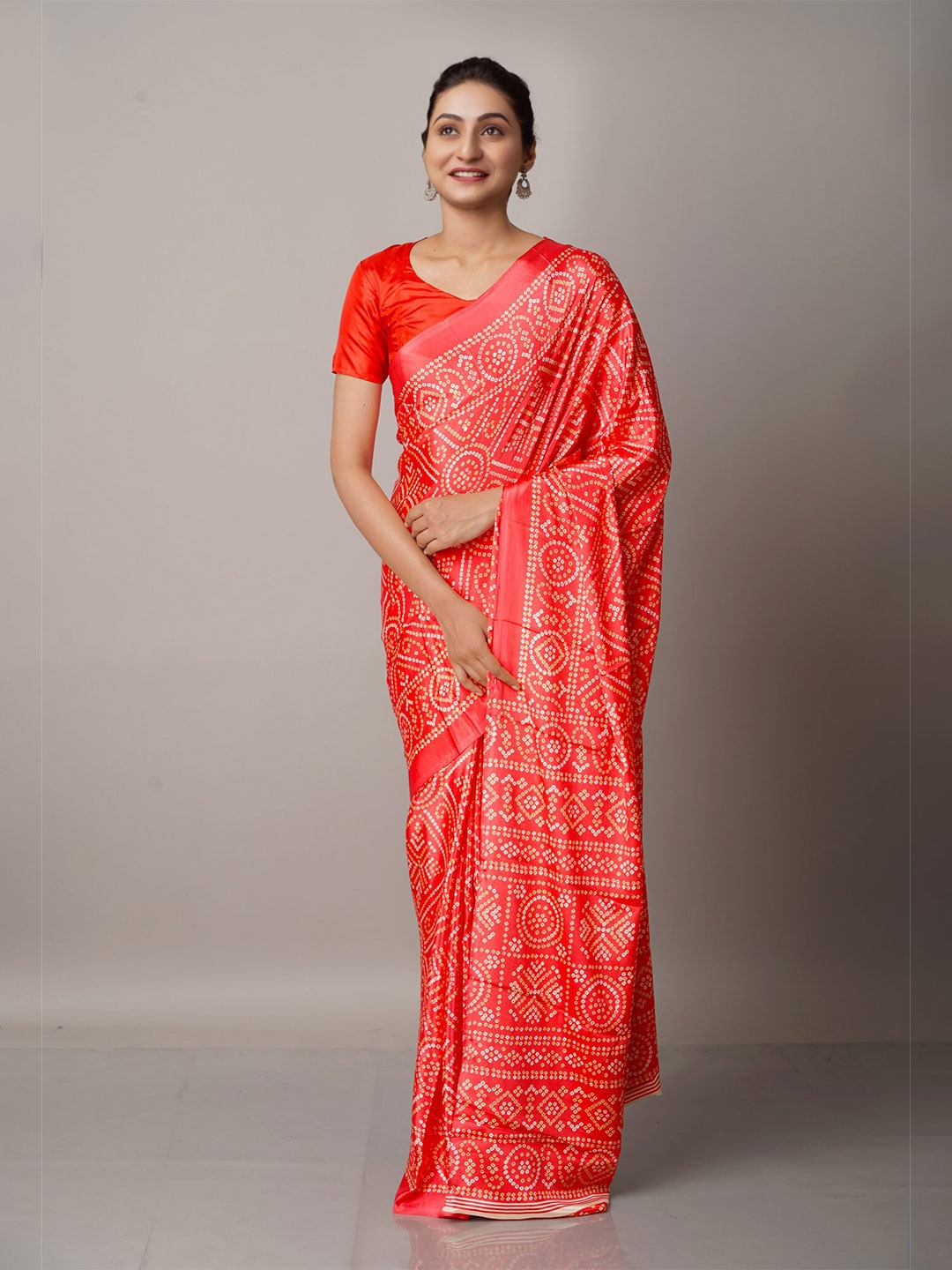 

Unnati Silks Red & White Bandhani Saree