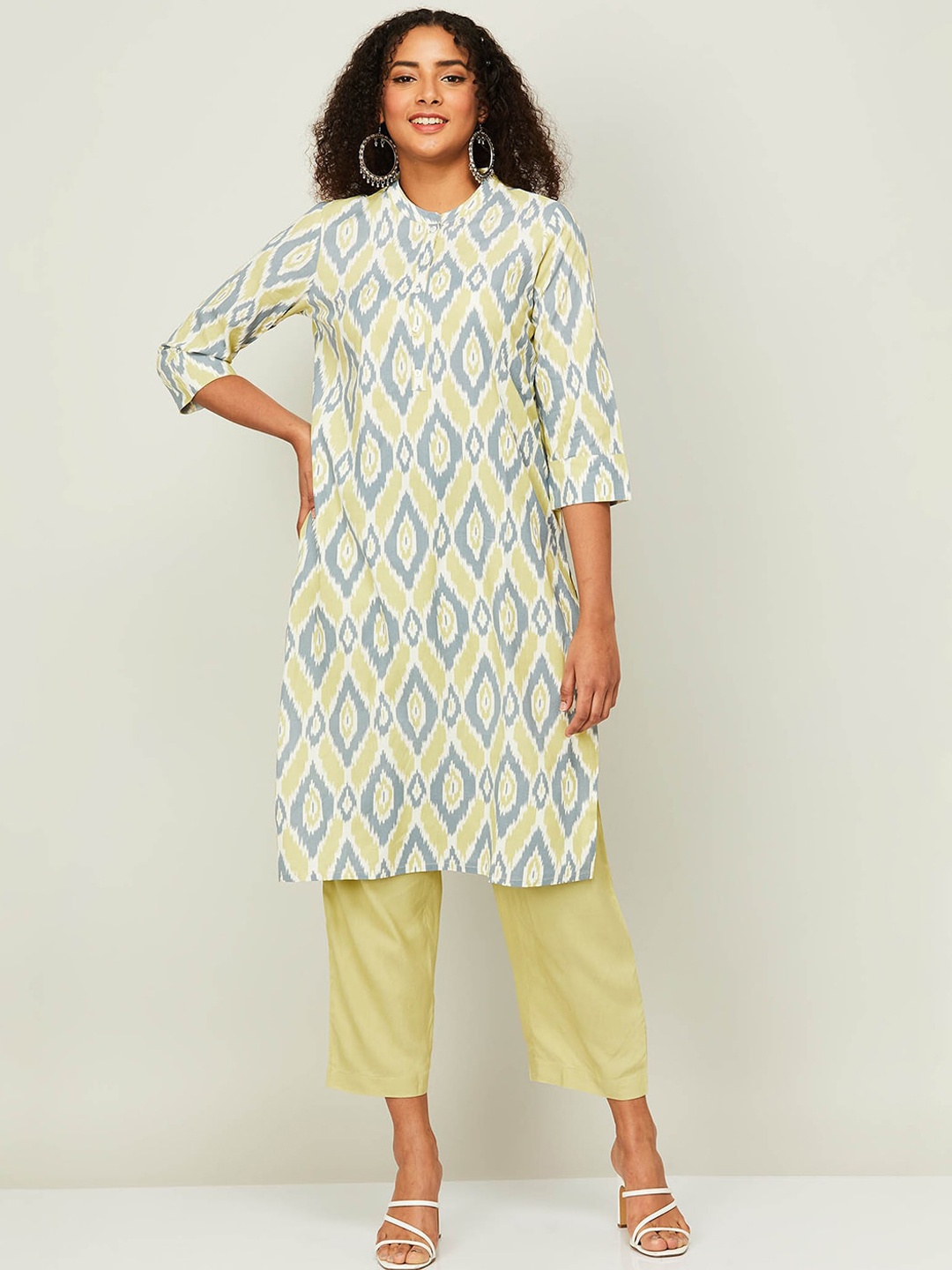 

Melange by Lifestyle Abstract Printed Straight Kurta with Trousers, Yellow
