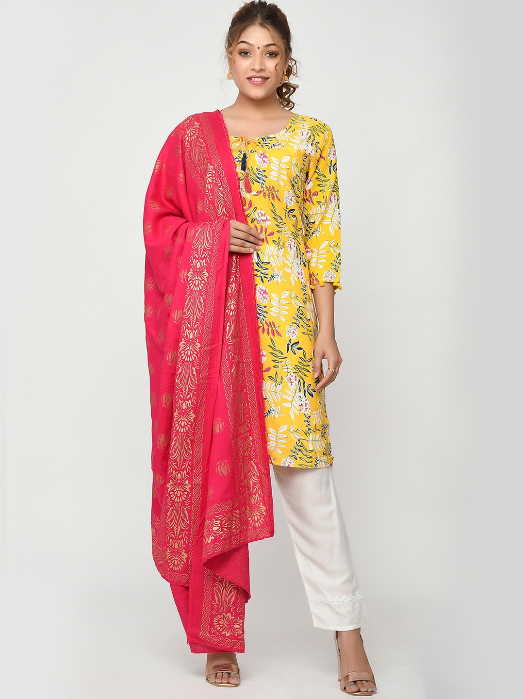 

Kesarya Ethnic Motifs Printed Tie Up Neck Beads and Stones Kurta with Trousers & Dupatta, Yellow