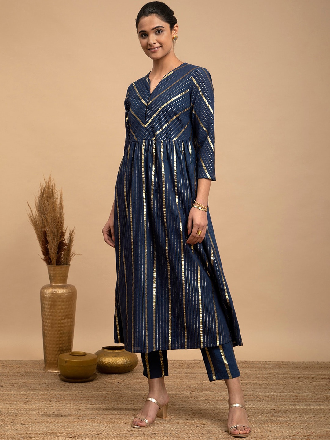 

Pink Fort Notched Neck Pleated Striped Anarkali Kurta with Trousers, Navy blue
