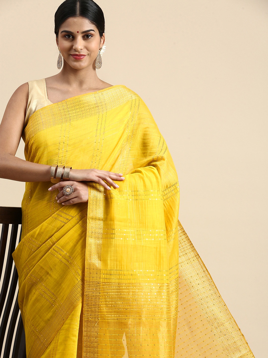 

Kaizen TEXO FAB Striped Sequinned Zari Linen Blend Saree, Mustard