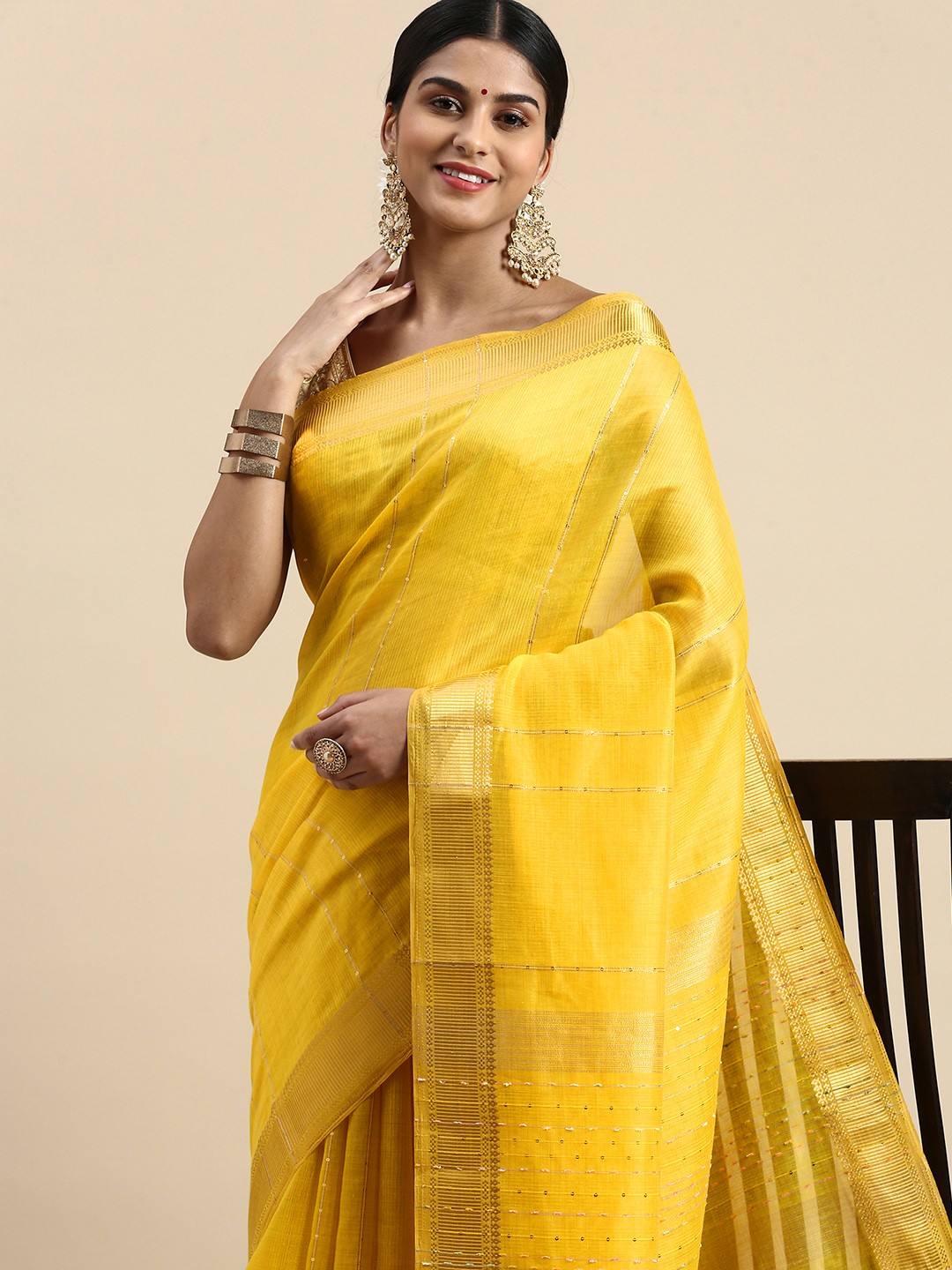 

Kaizen TEXO FAB Striped Sequinned Zari Linen Blend Saree, Mustard