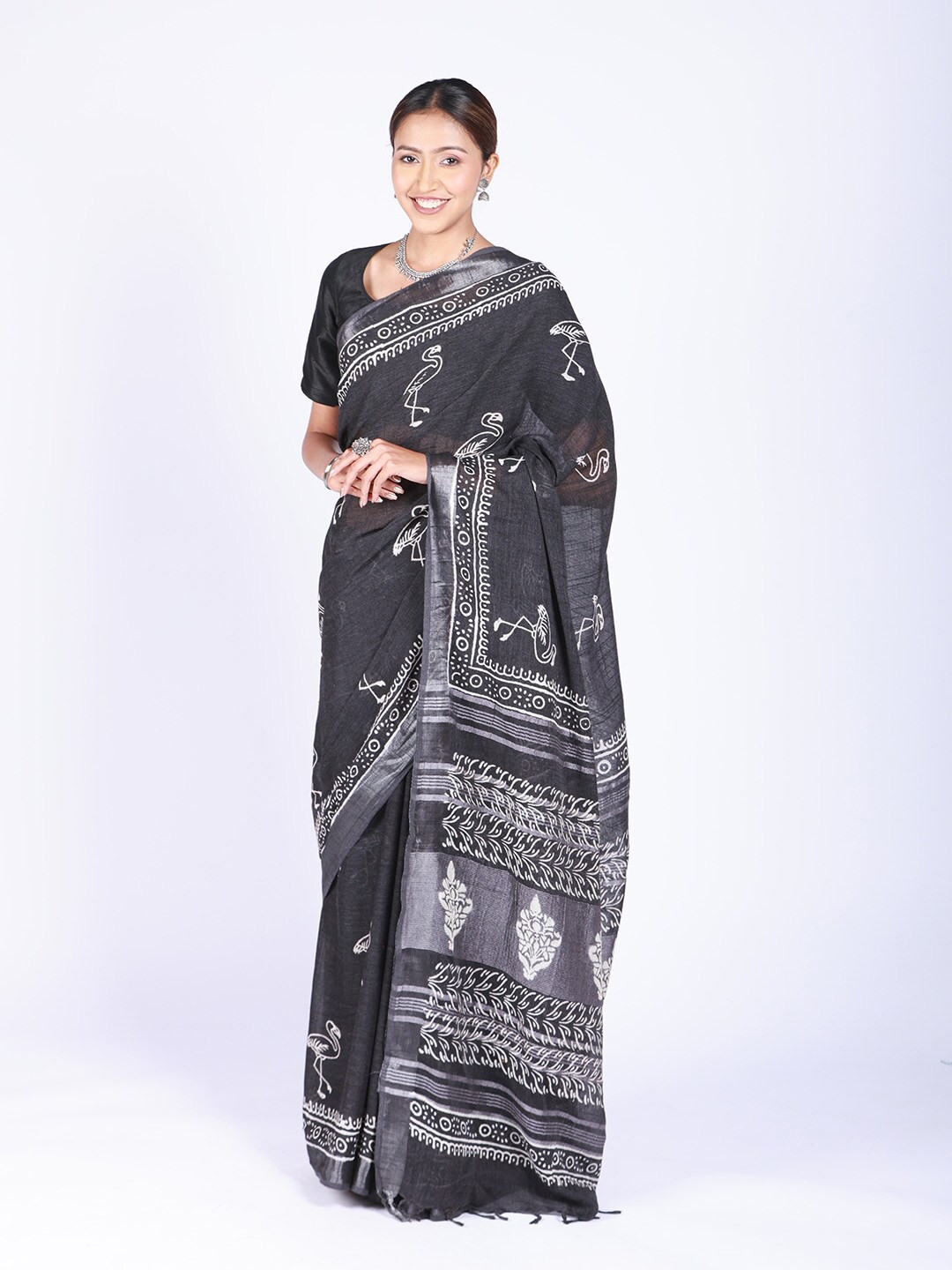 

ReshaWeaves Black & White Ethnic Motifs Zari Pure Linen Saree