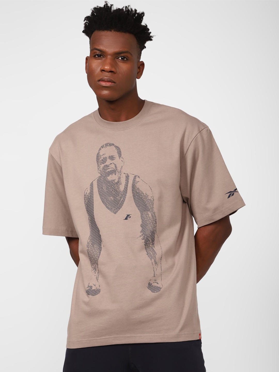 

Reebok Men CNY Graphic Printed Pure Cotton T-shirt, Beige