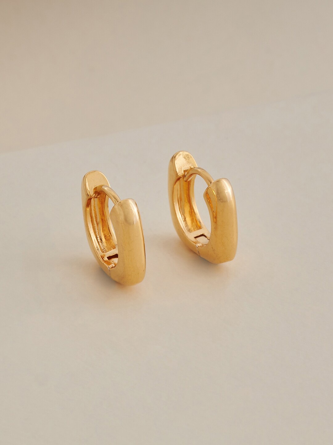 

Kushal's Fashion Jewellery Gold Plated Contemporary Hoop Earrings
