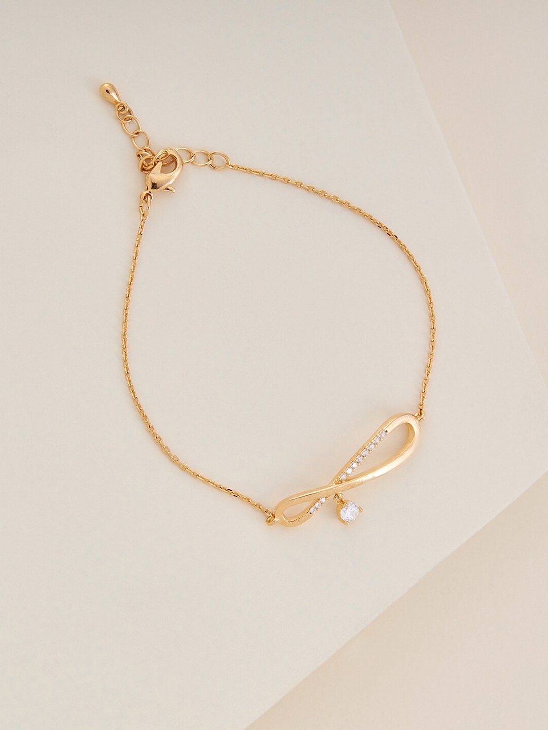 

Kushal's Fashion Jewellery Women Cubic Zirconia Gold-Plated Charm Bracelet
