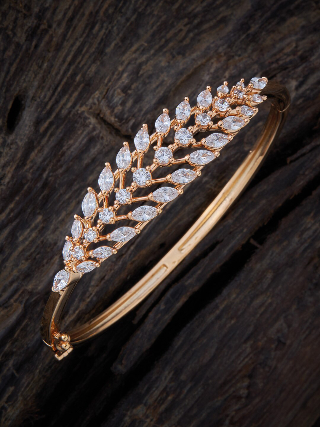 

Kushal's Fashion Jewellery Cubic Zirconia Gold-Plated Bangle-Style Bracelet