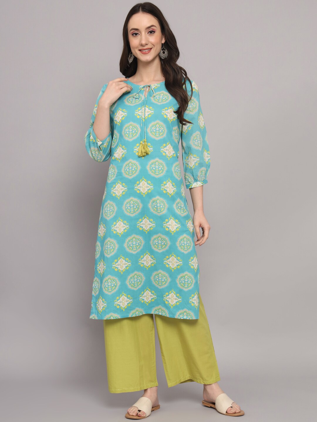 

Sutidora Tie-Up Neck Ethnic Motifs Printed Straight Pure Cotton Kurta with Palazzos, Turquoise blue