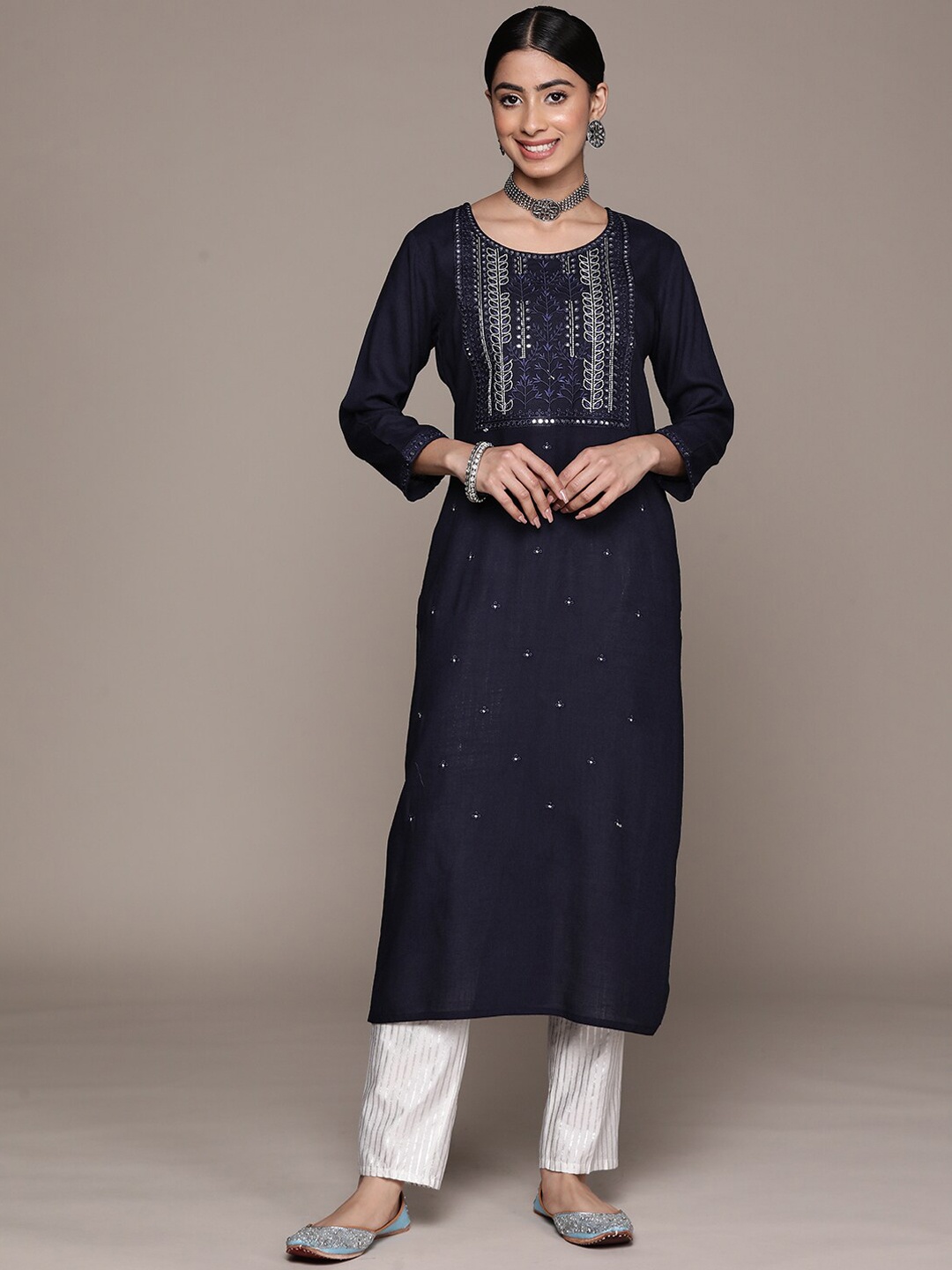 

Ishin Women Navy Blue Geometric Embroidered Flared Sleeves Thread Work Kurta
