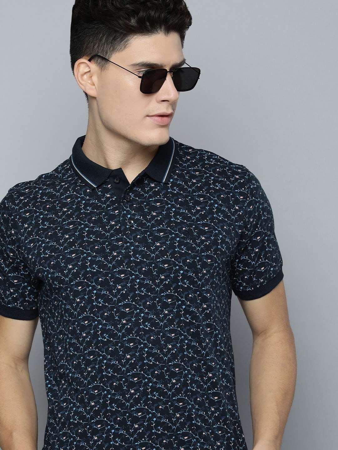

Indian Terrain Men Navy Blue Floral Printed Polo Collar Pure Cotton Slim Fit T-shirt
