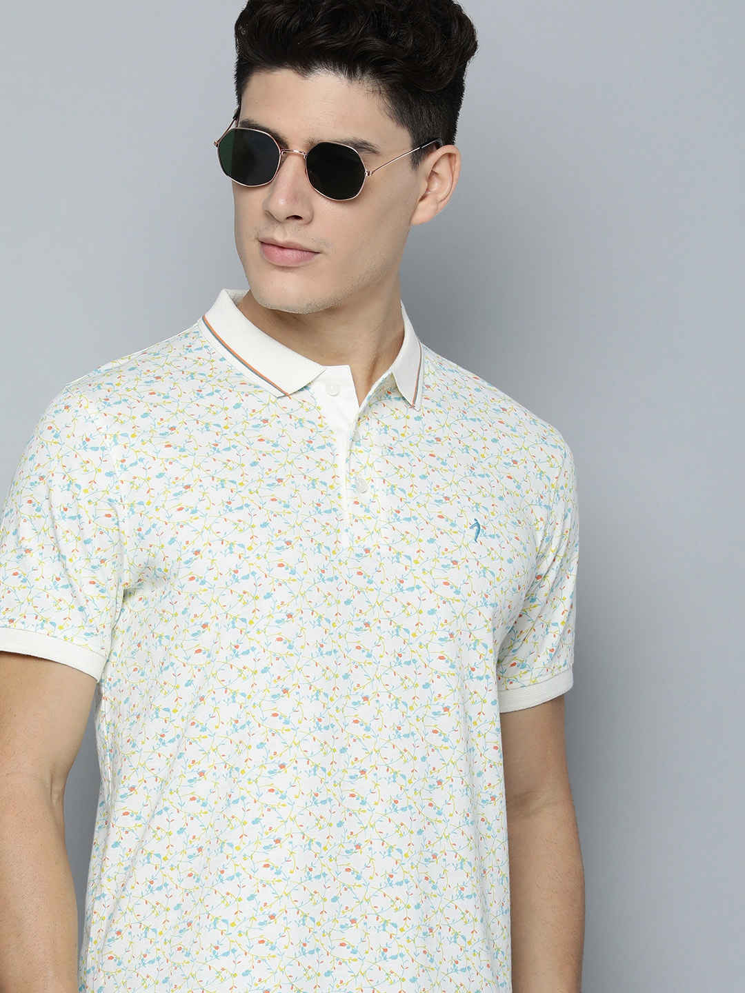 

Indian Terrain Men Off White & Blue Floral Printed Polo Collar Pure Cotton Slim Fit T-shirt