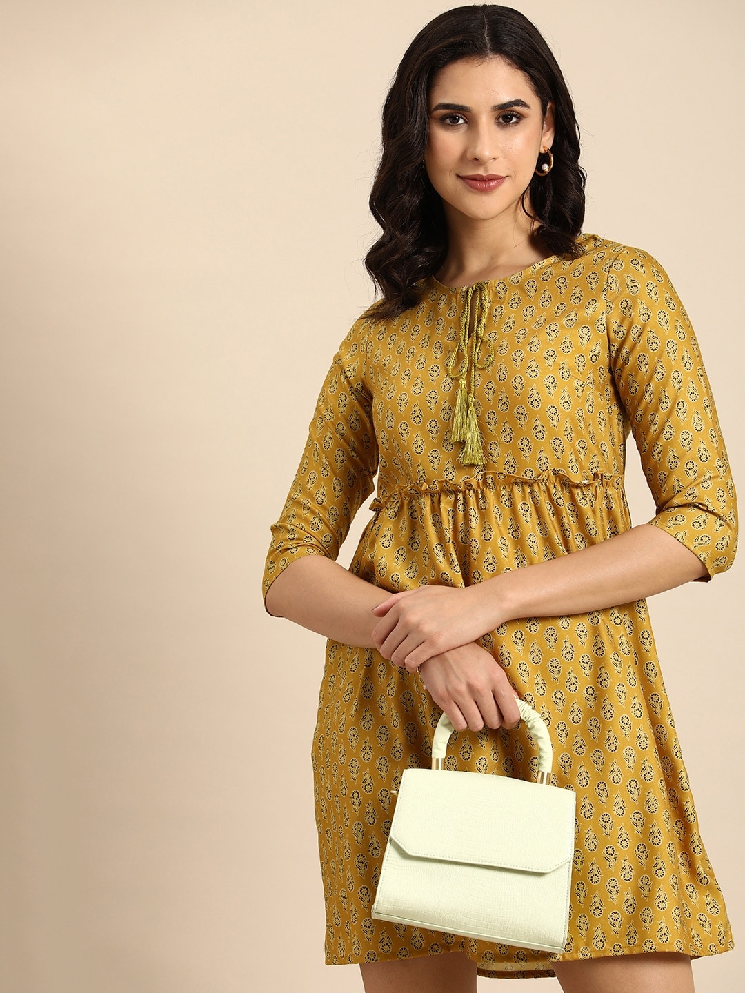 

Anouk Ethnic Motifs Printed Tie-Up Neck A-Line Dress, Mustard