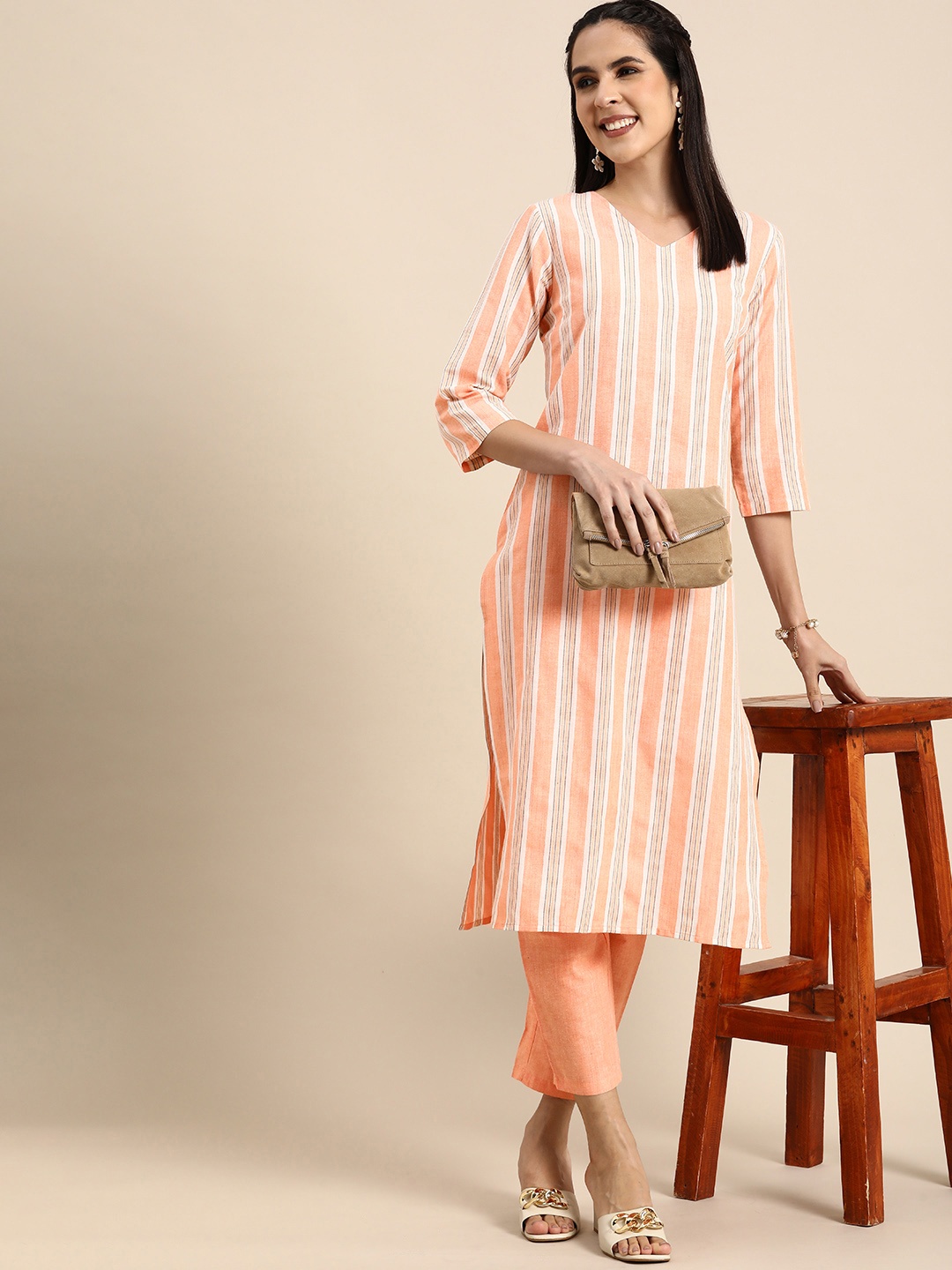 

Anouk Women Striped Regular Kurta With Trousers, Peach