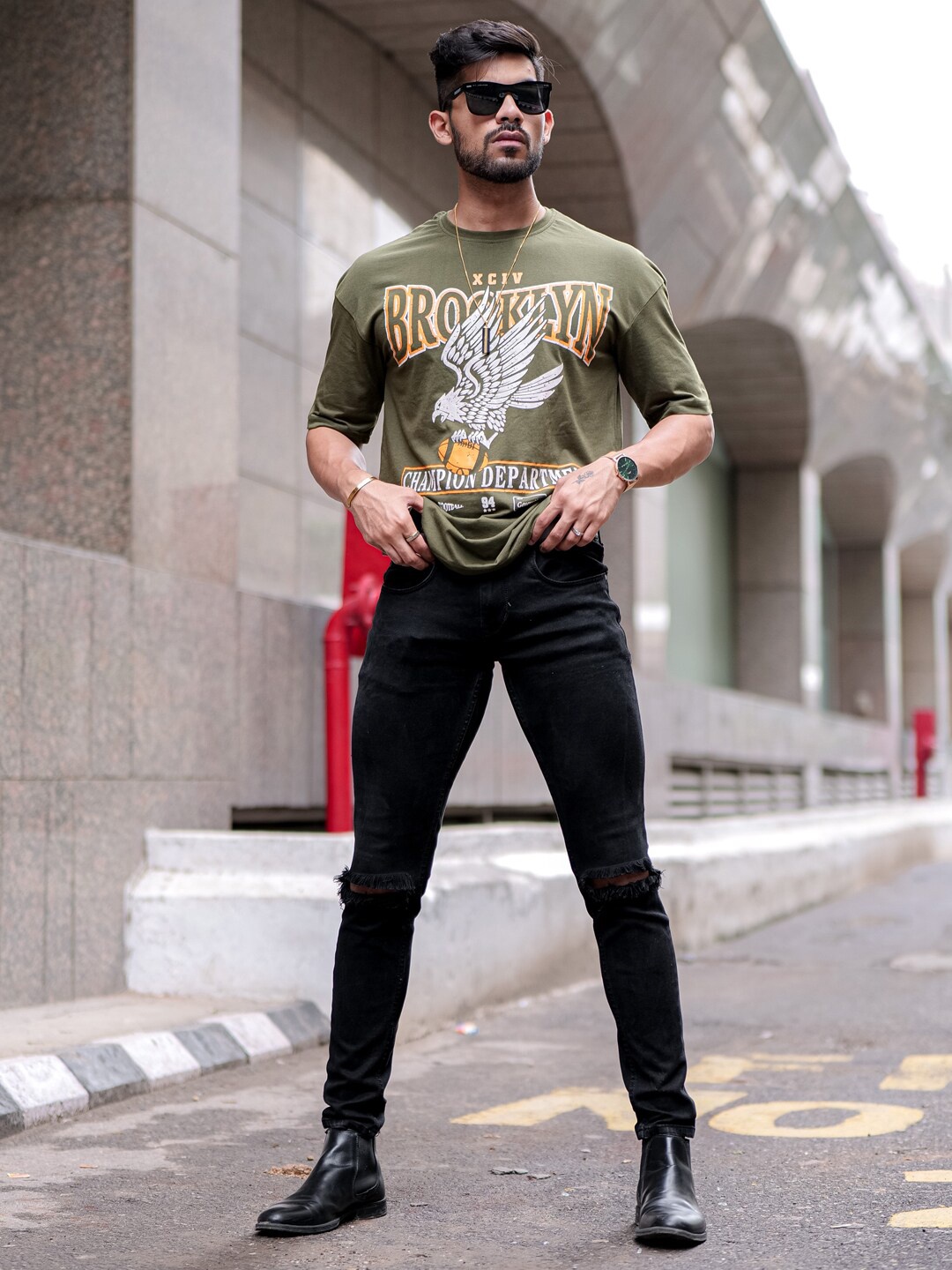 

Powerlook Olive green, White & Yellow Typography Printed Loose Fit T-shirt