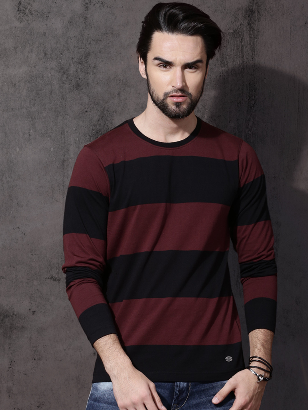 

Roadster Men Maroon & Black Striped Round Neck T-shirt