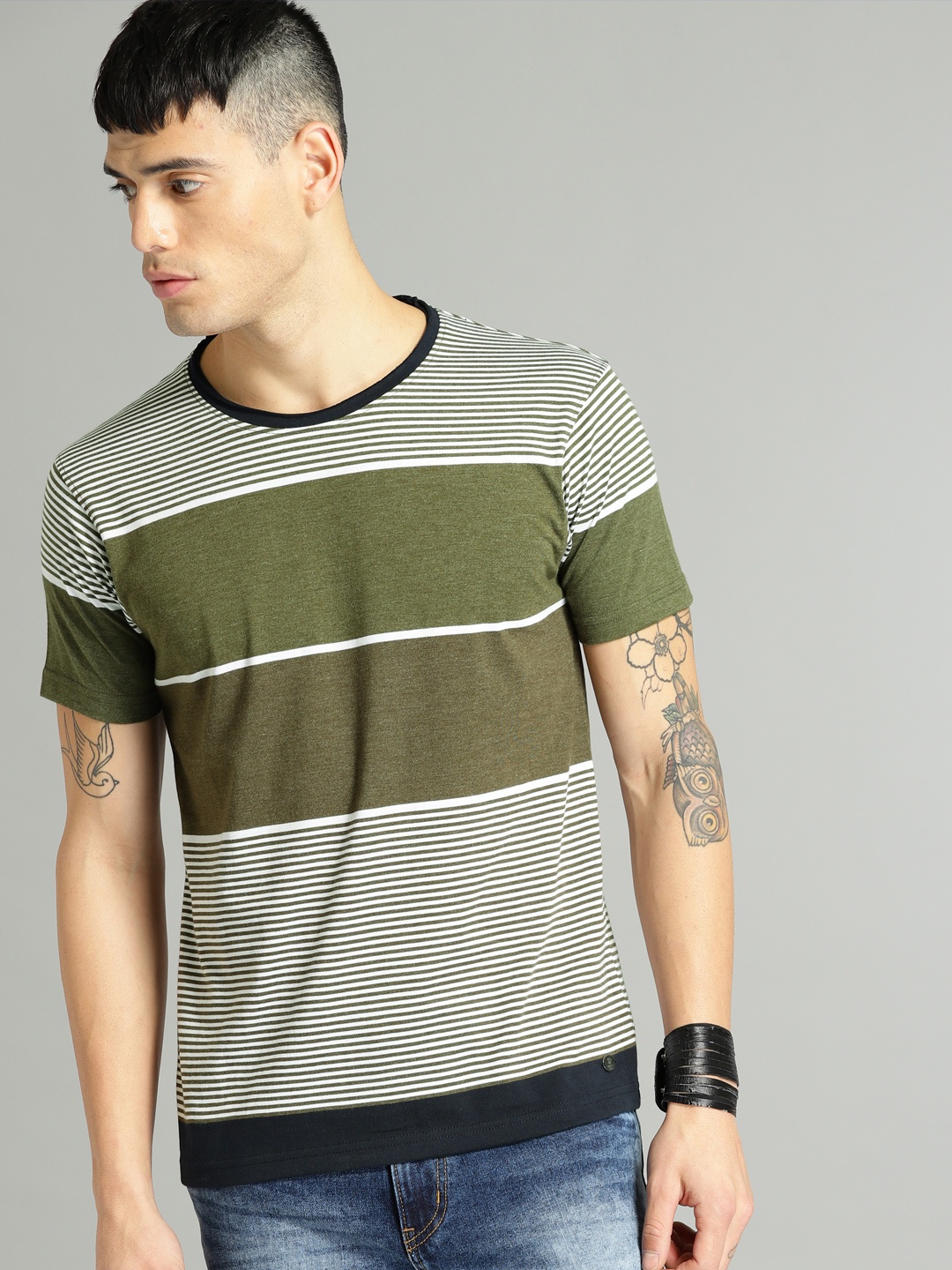 

Roadster Men Olive Green Striped Round Neck T-shirt